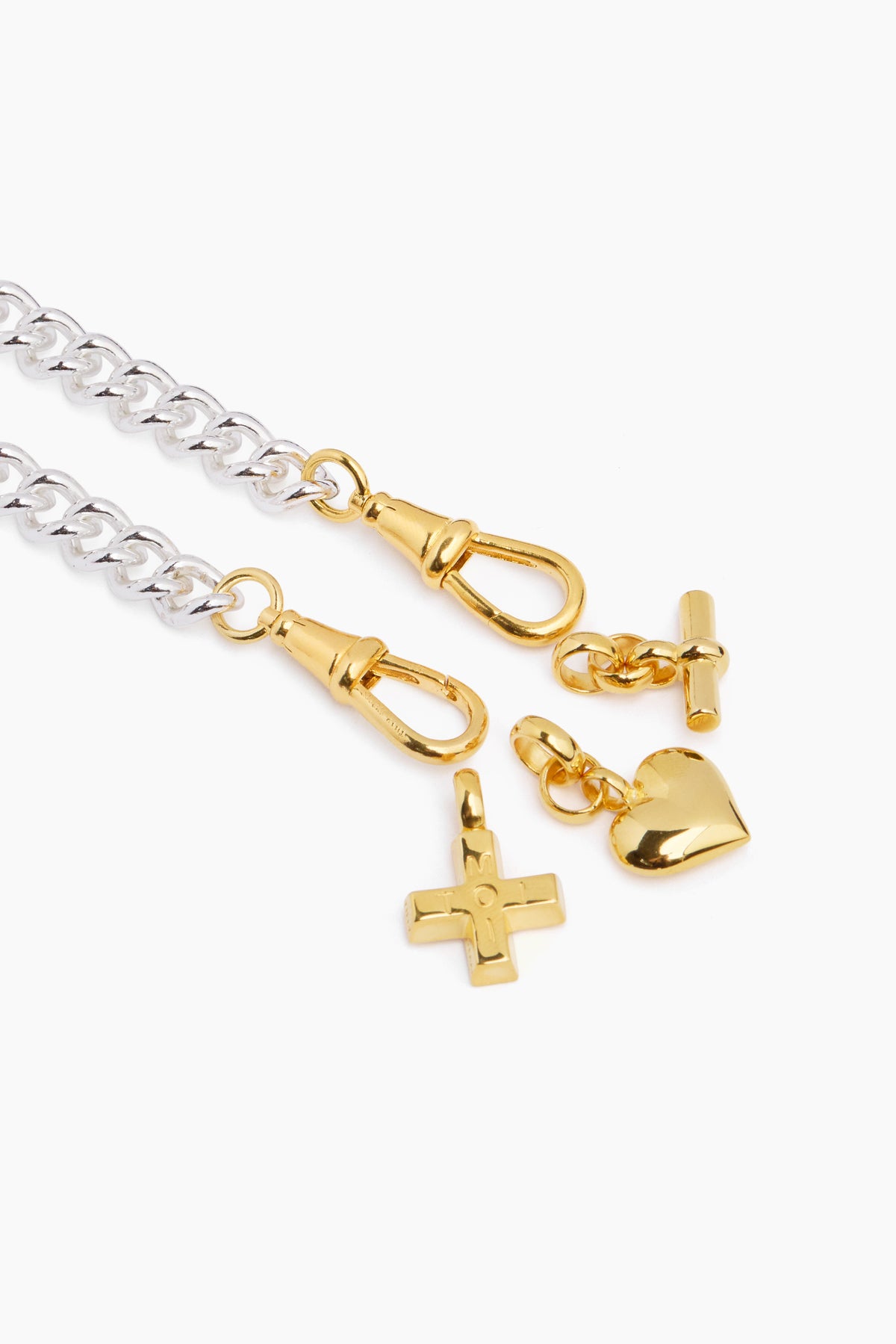 Silver chain charm bracelet with gold heart, lock, and cross dangling charms
