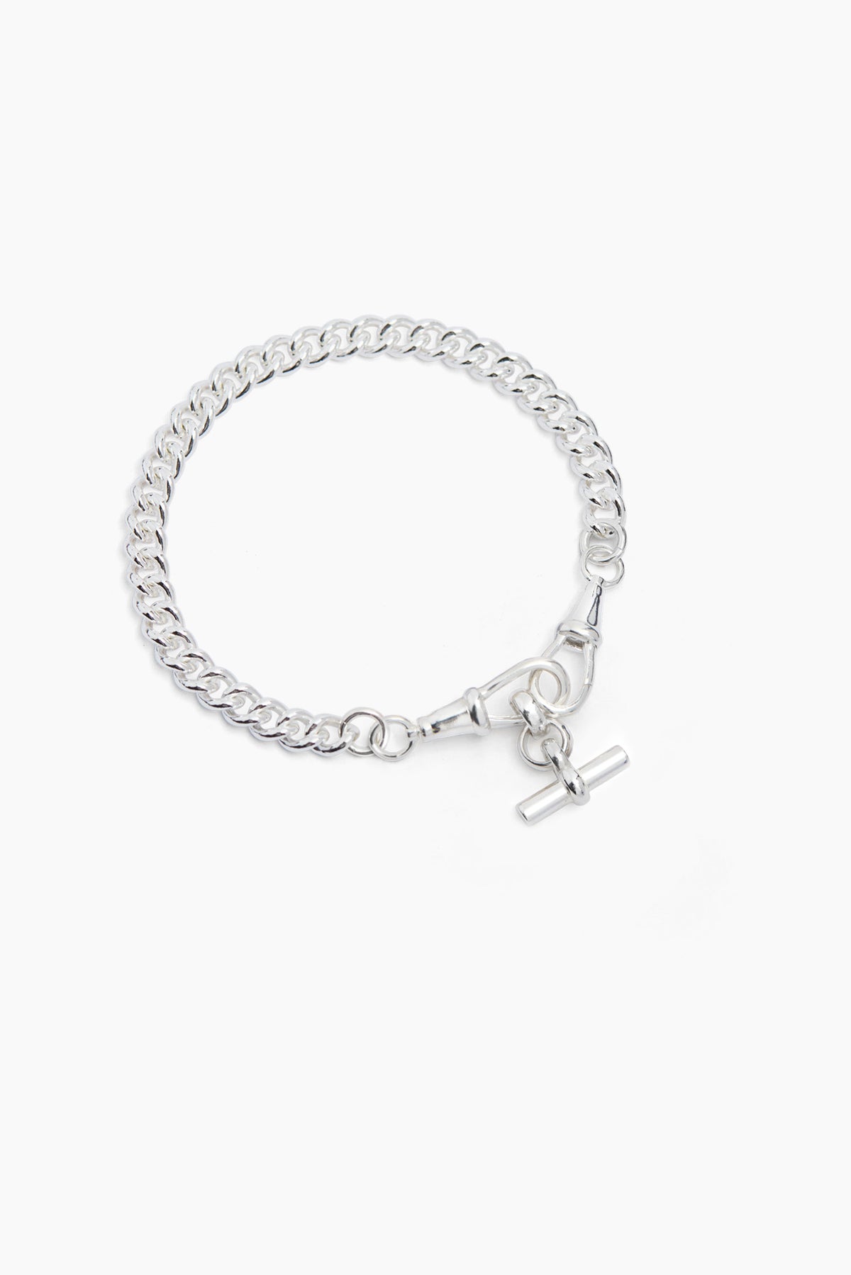 Silver chain bracelet with charm cross and oval clasp