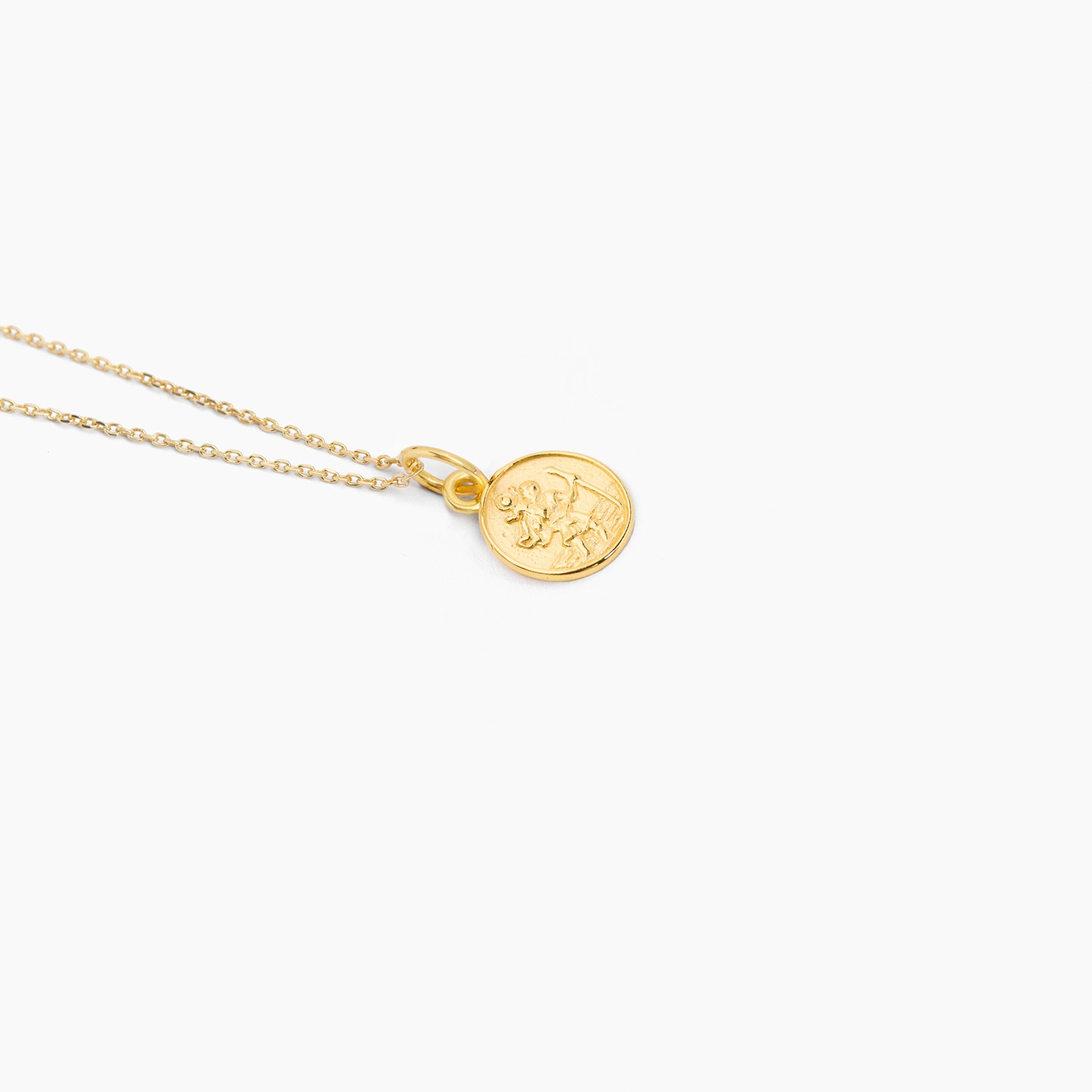 Gold trace chain with round St Christopher charm pendant, coin-style medallion