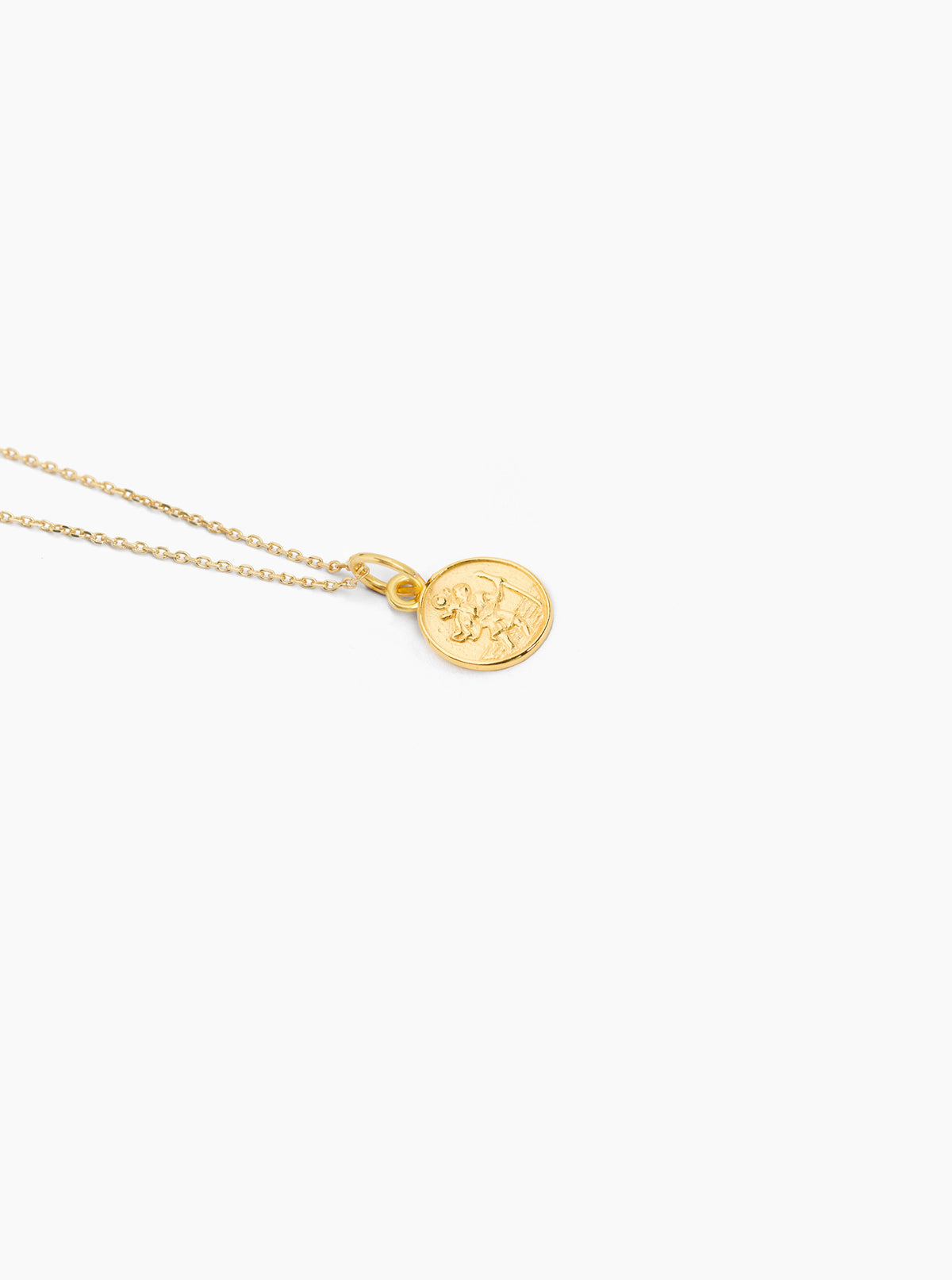 Gold trace chain with round St Christopher charm pendant, coin-style medallion