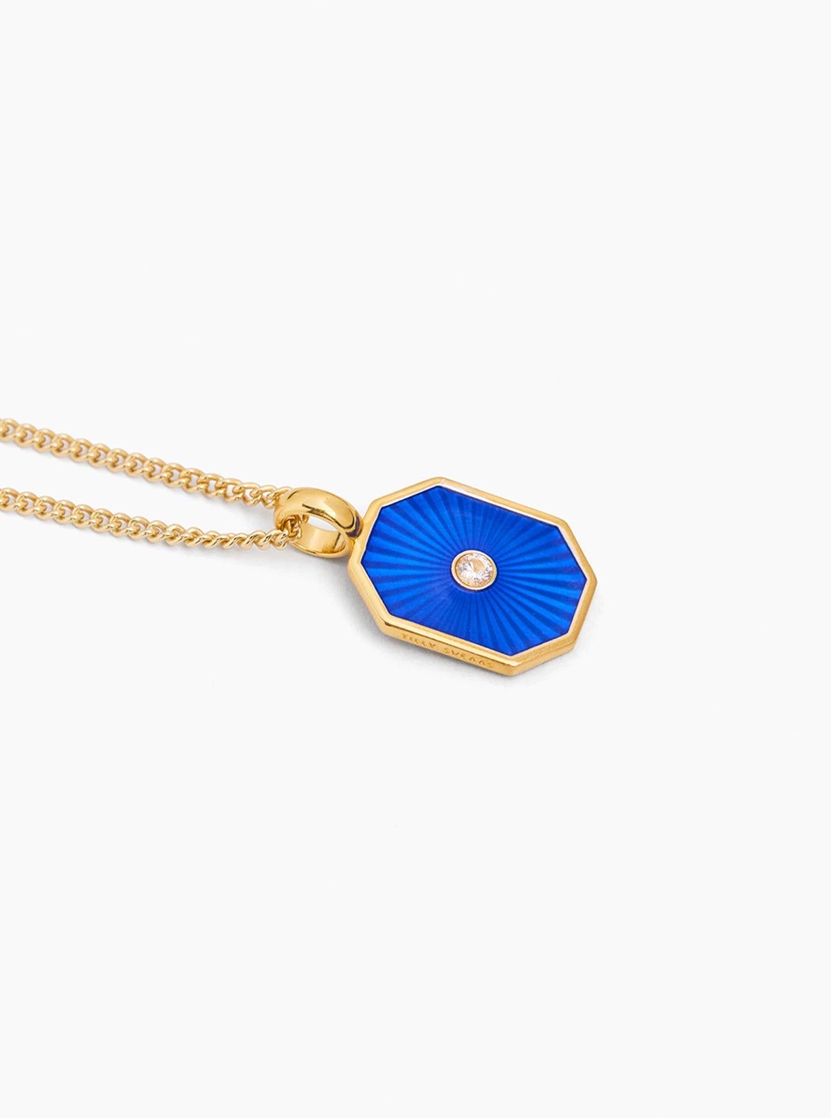 Gold chain necklace with navy octagon pendant and small round gem