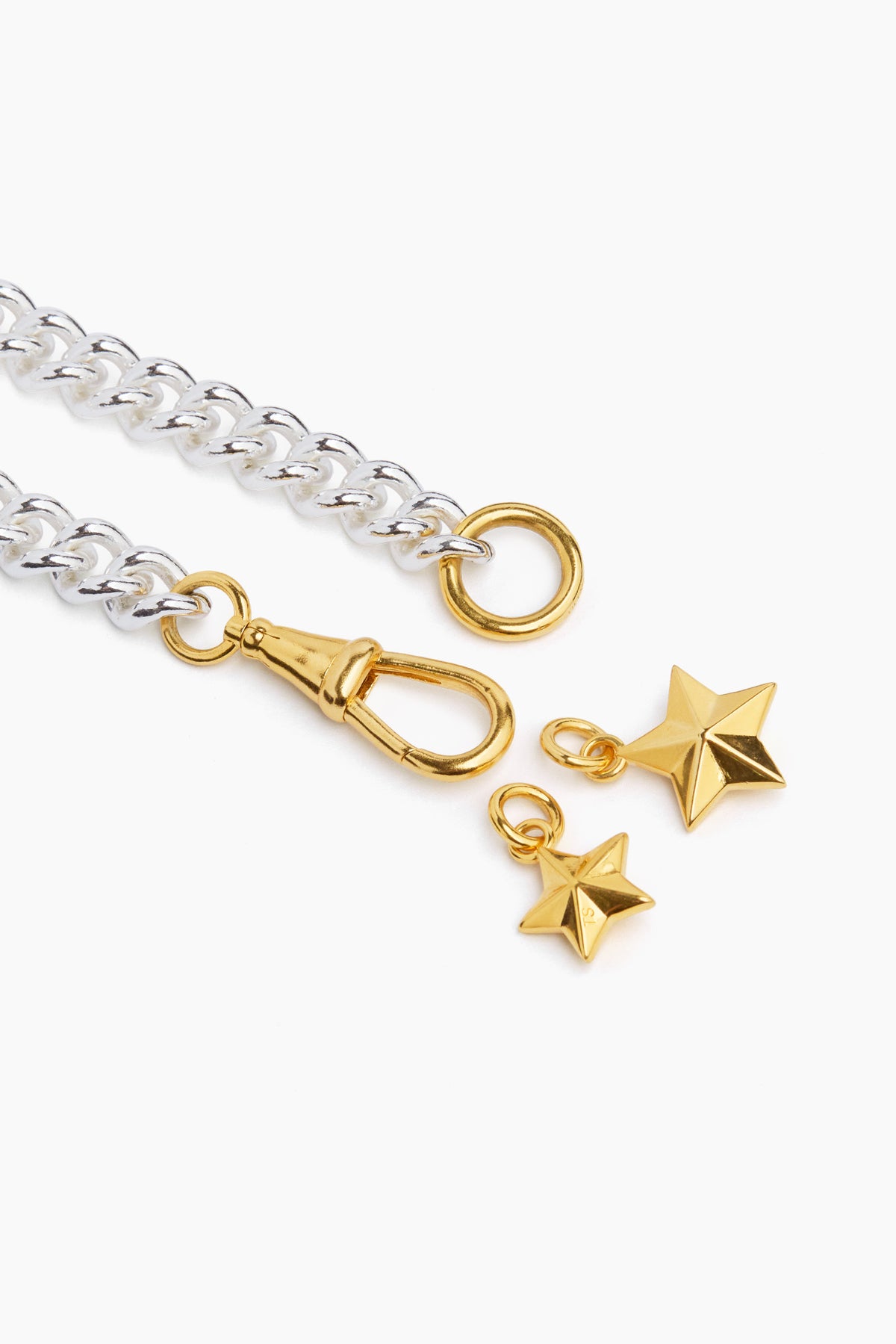 Two-tone chain bracelet with gold star pendants and clasp