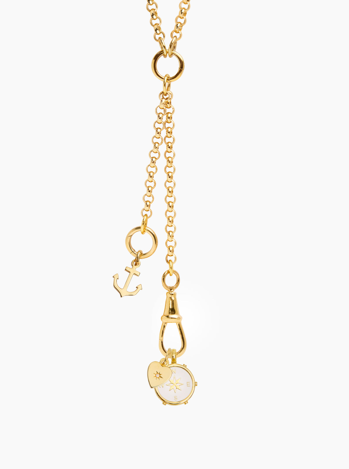 Gold chain charm necklace with anchor, compass medallion, and clock face dangle
