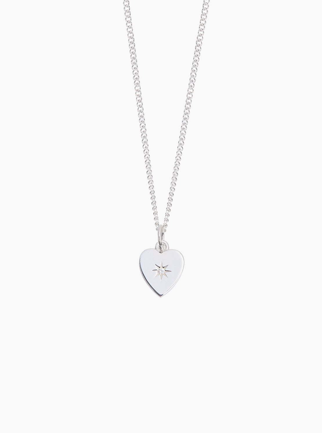 Silver heart pendant on fine curb chain necklace, flat jeweled heart charm.