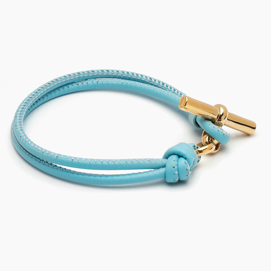 Pale blue leather T-bar bracelet with gold clasp