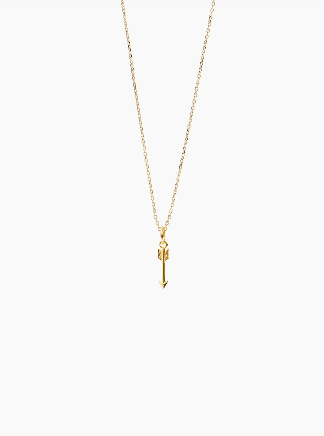 Gold arrow pendant necklace on trace chain with small pointed charm