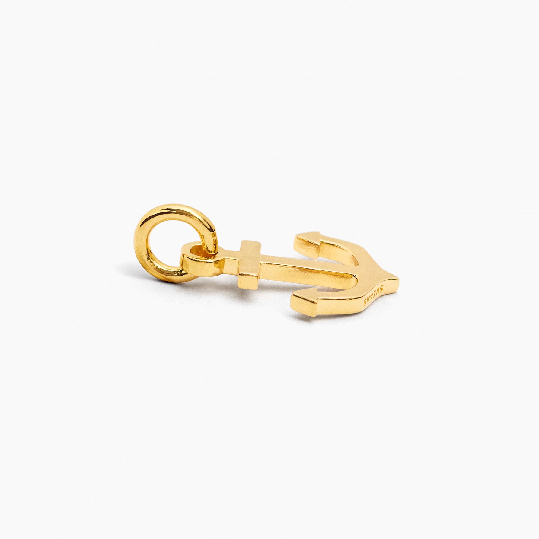 Gold anchor charm with hinged loop and anchor shape