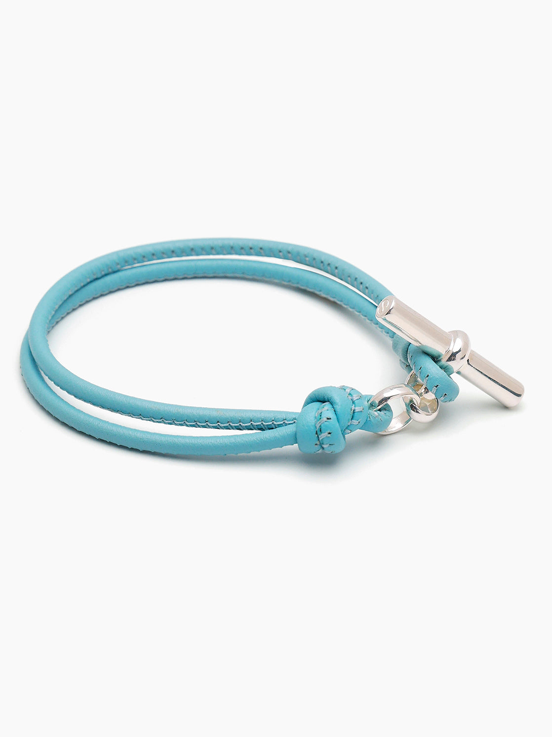 Turquoise leather bracelet with silver T-bar clasp and small turquoise bead accent