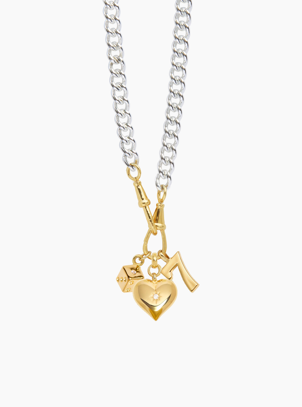 Layered charm necklace with silver and gold chains, gold heart and key pendants