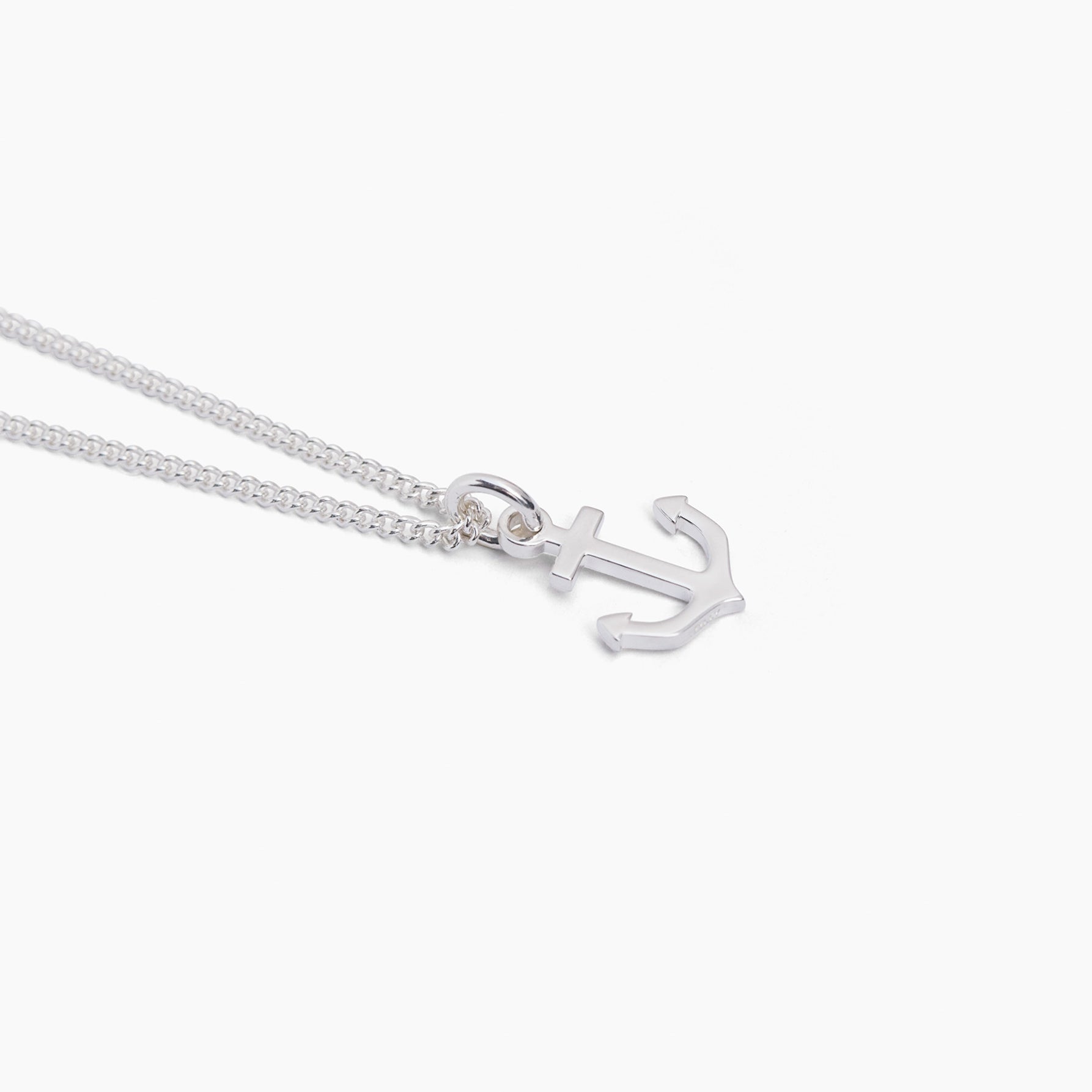 Silver anchor pendant and clasp on fine curb chain necklace