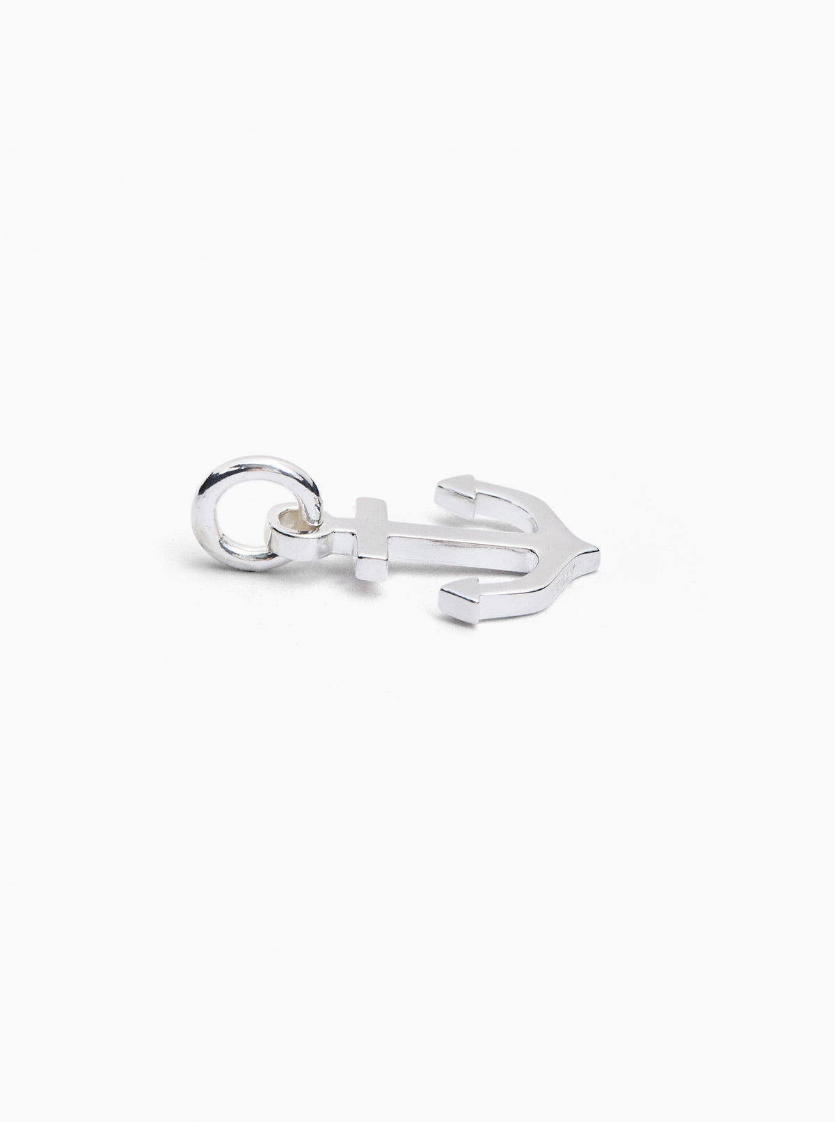 Small silver anchor charm with hinged clasp and round loop