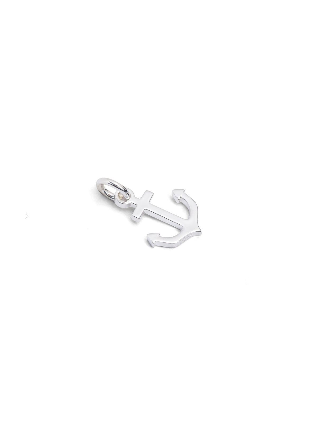 Small silver anchor charm with round loop and crossbar detail