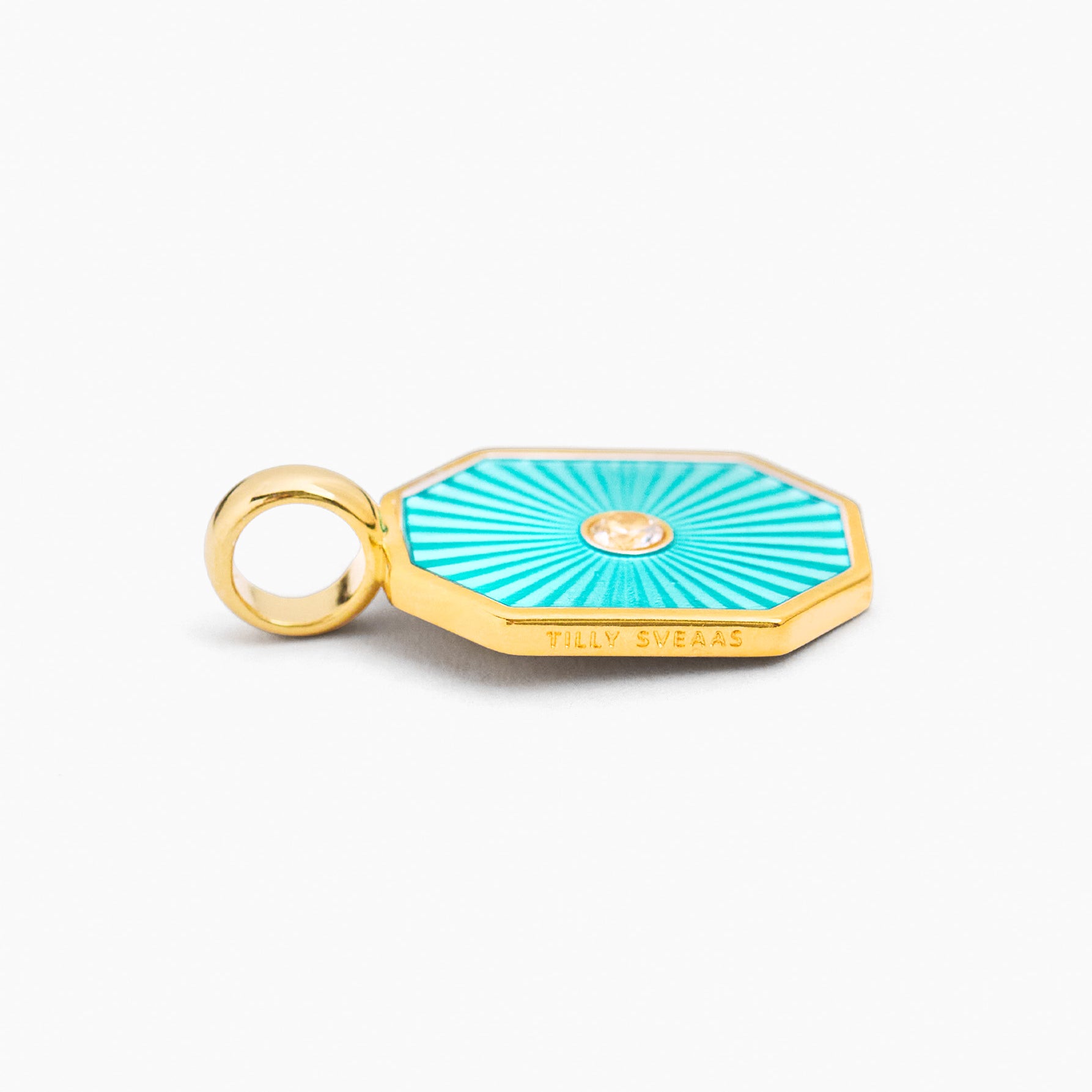 Turquoise octagon charm with gold ring, striped enamel, and round center jewel