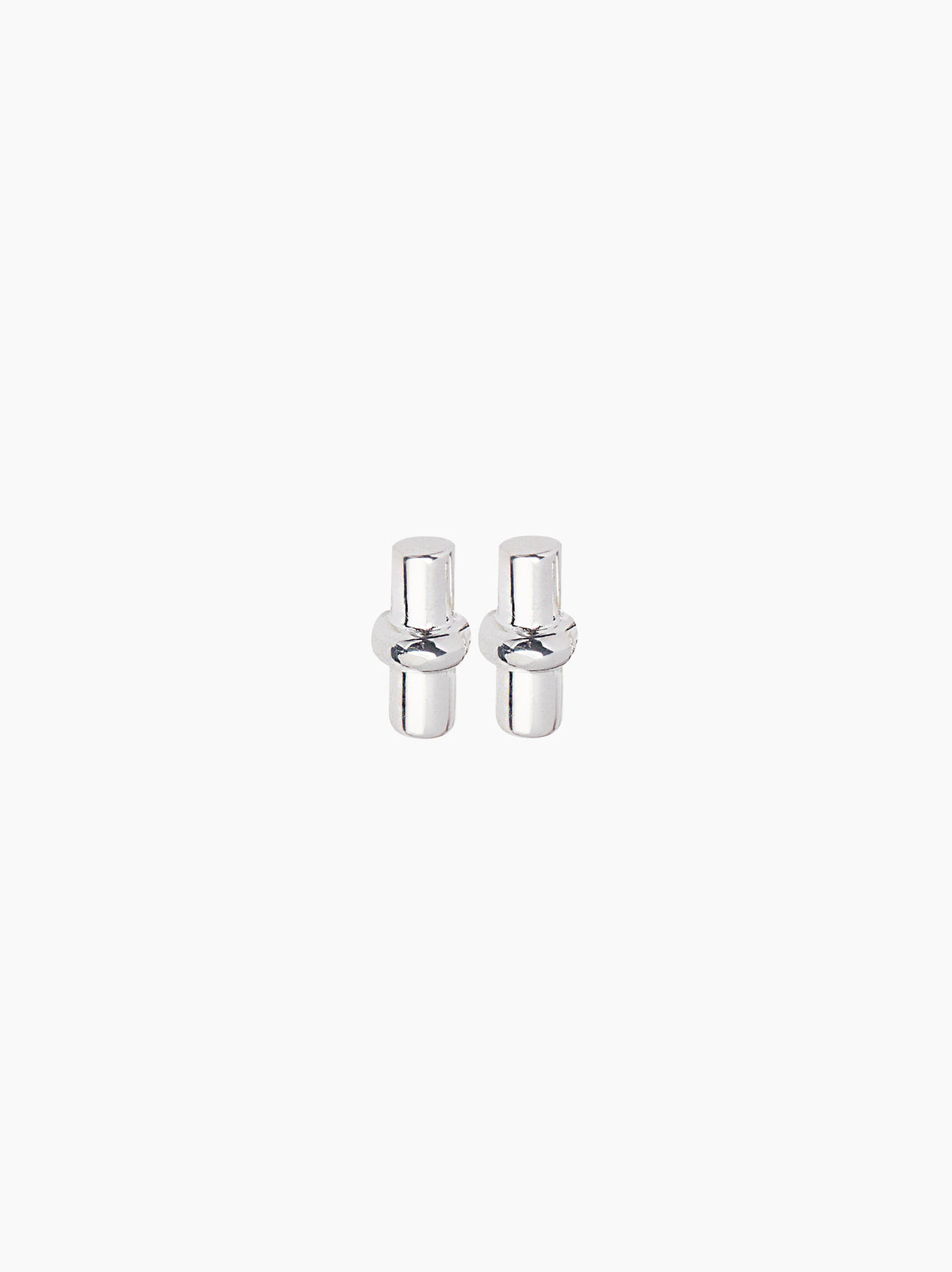 Close-up of silver T-bar stud earrings with polished posts and bars