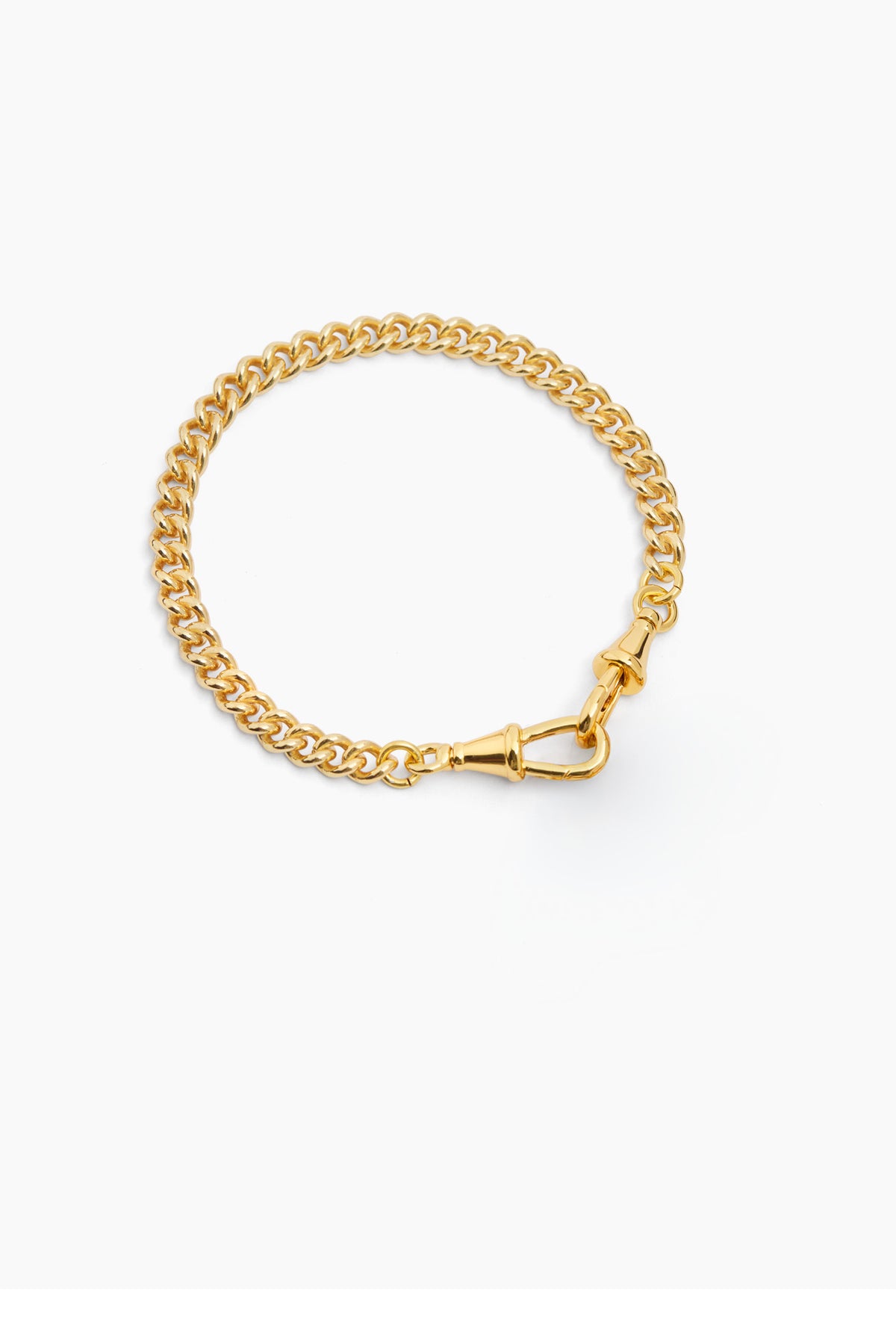 Slim gold curb chain bracelet with a lobster clasp