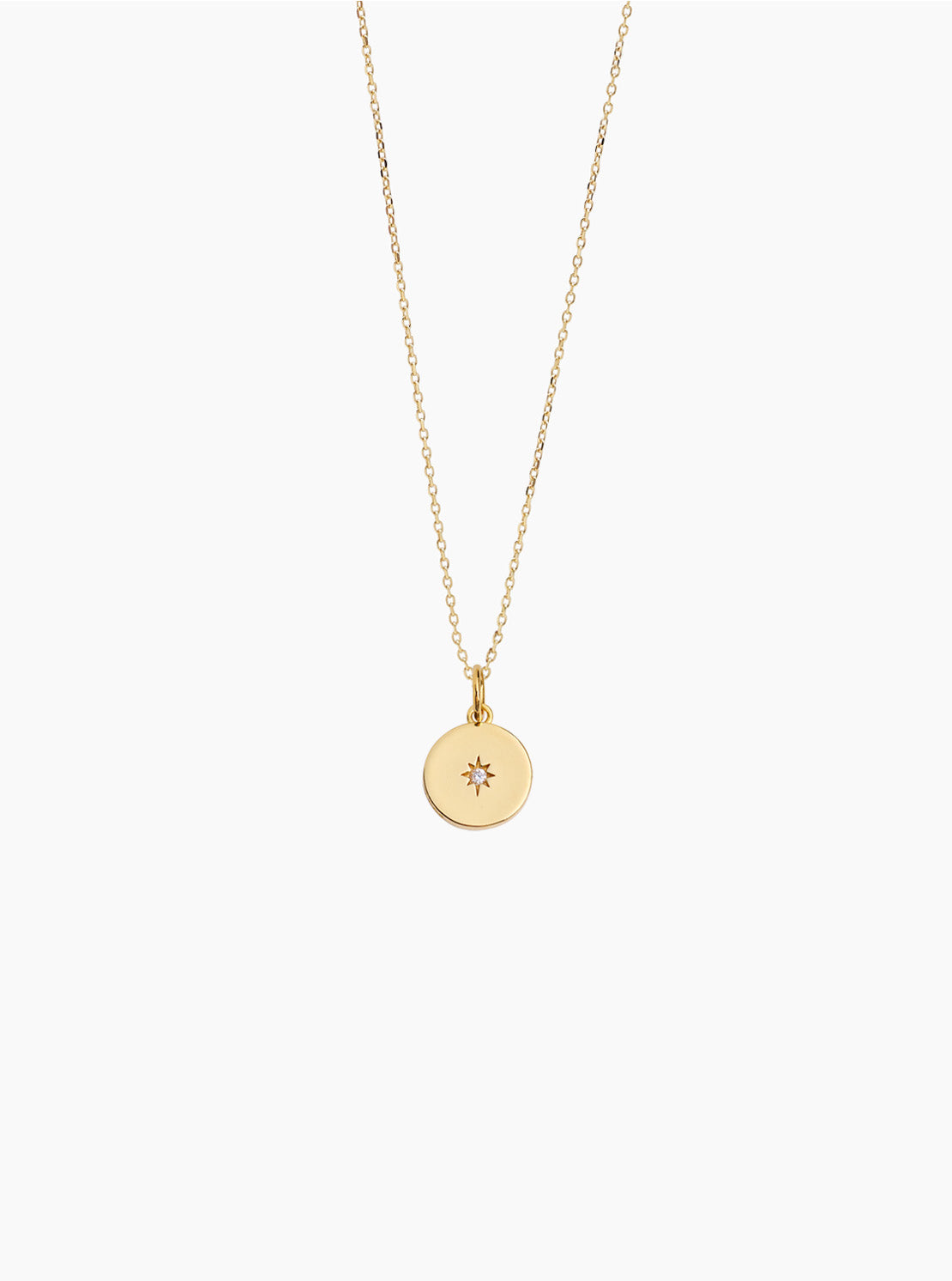 Gold round disc pendant necklace with trace chain, jewel detail on round charm
