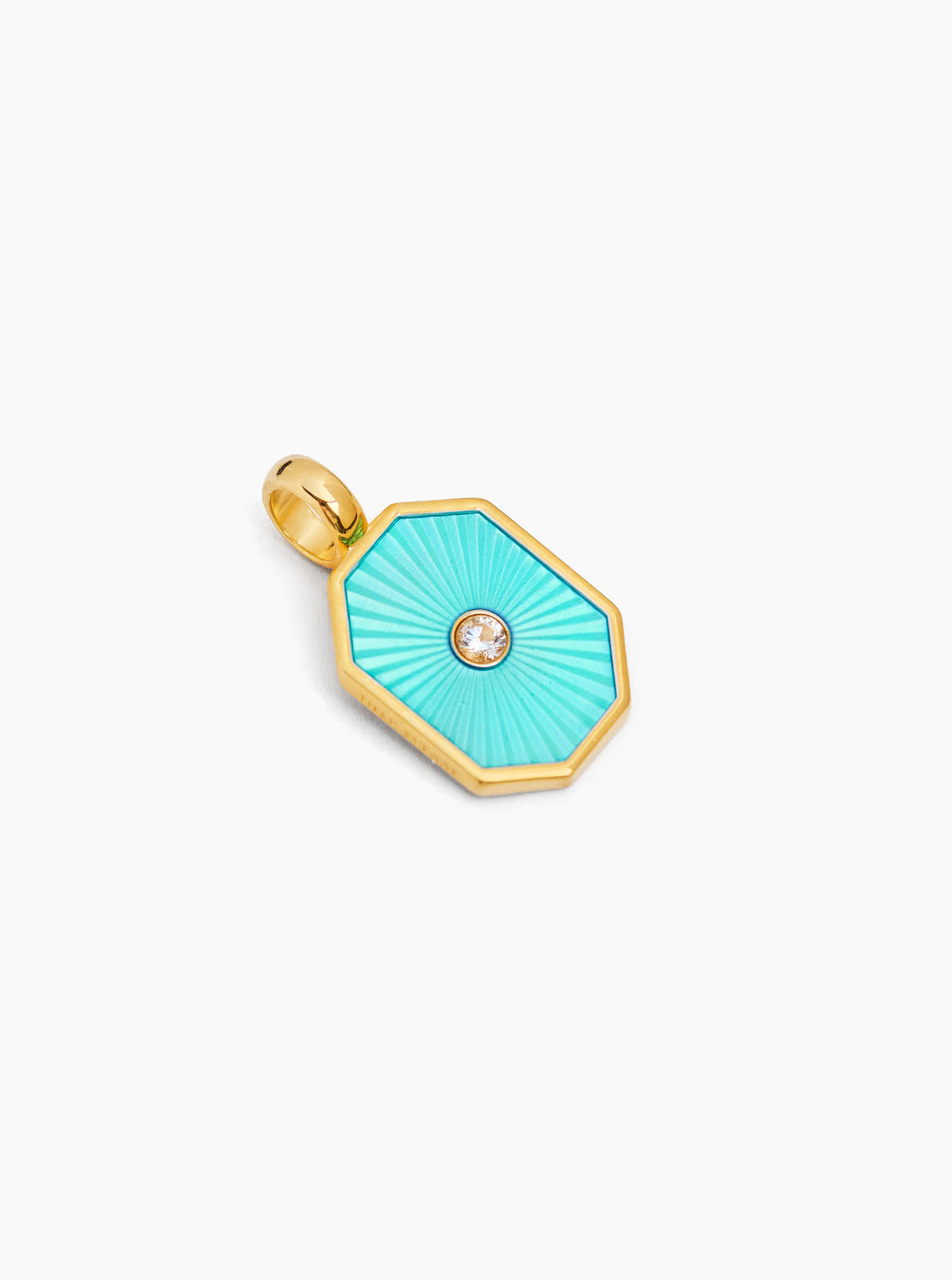 Turquoise octagon charm with gold-tone bail and small round center jewel