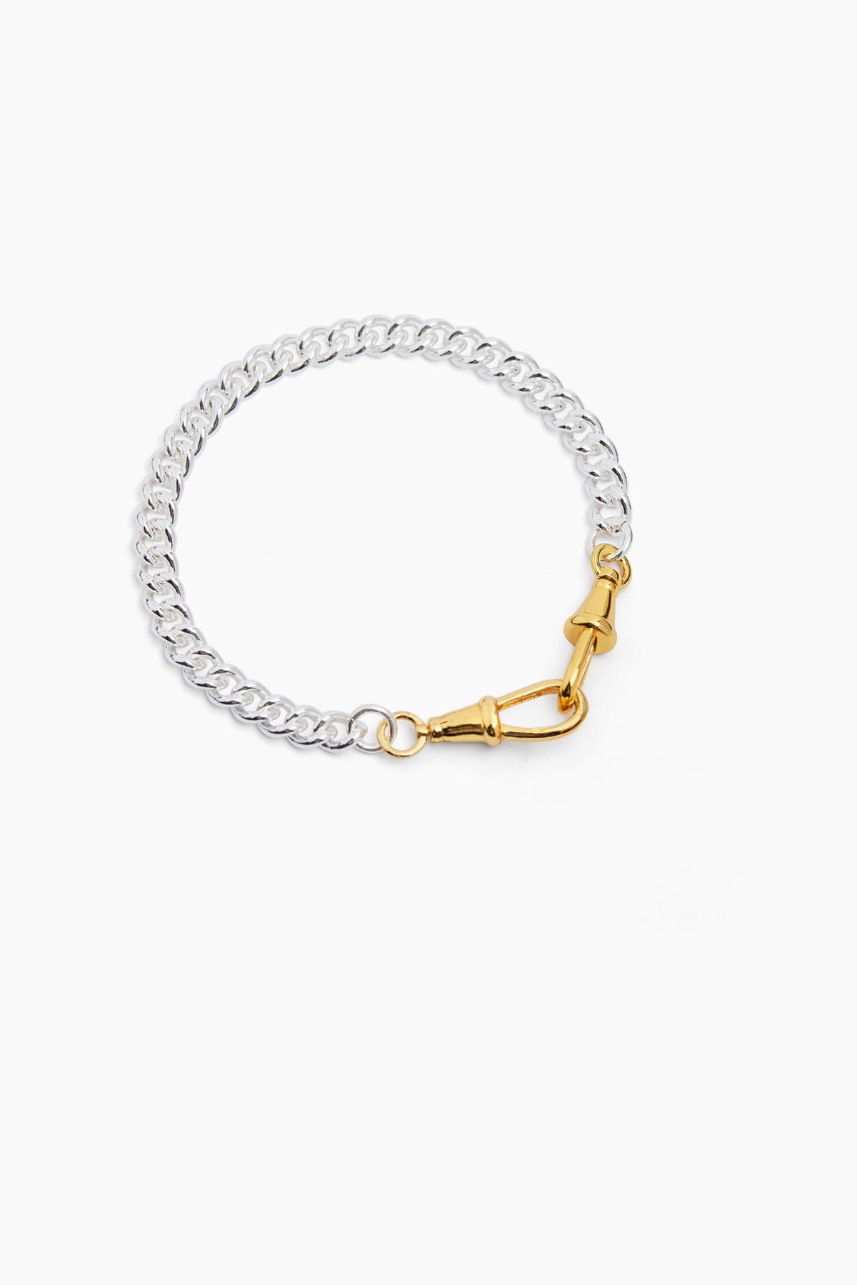 Slim silver curb bracelet with a gold-tone clip clasp
