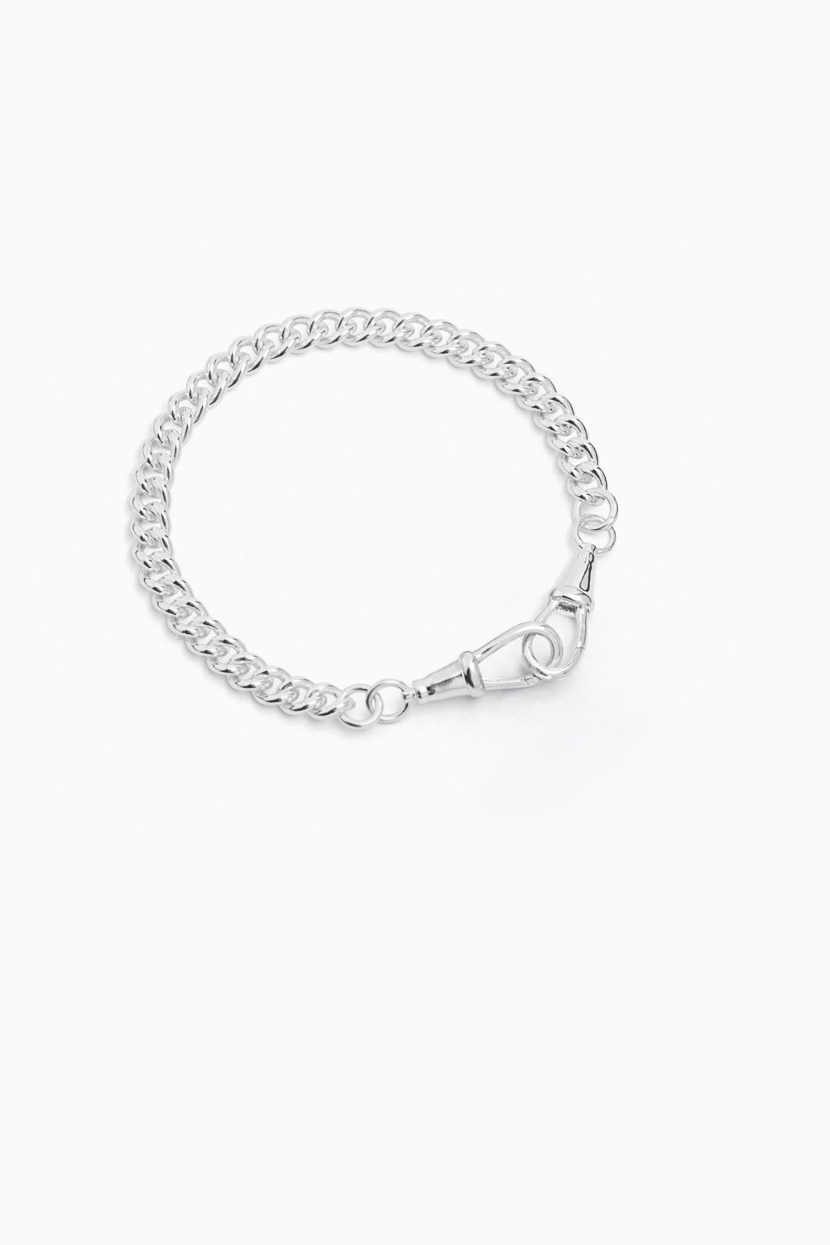 Slim silver curb bracelet with chunky oval links and a lobster clasp.