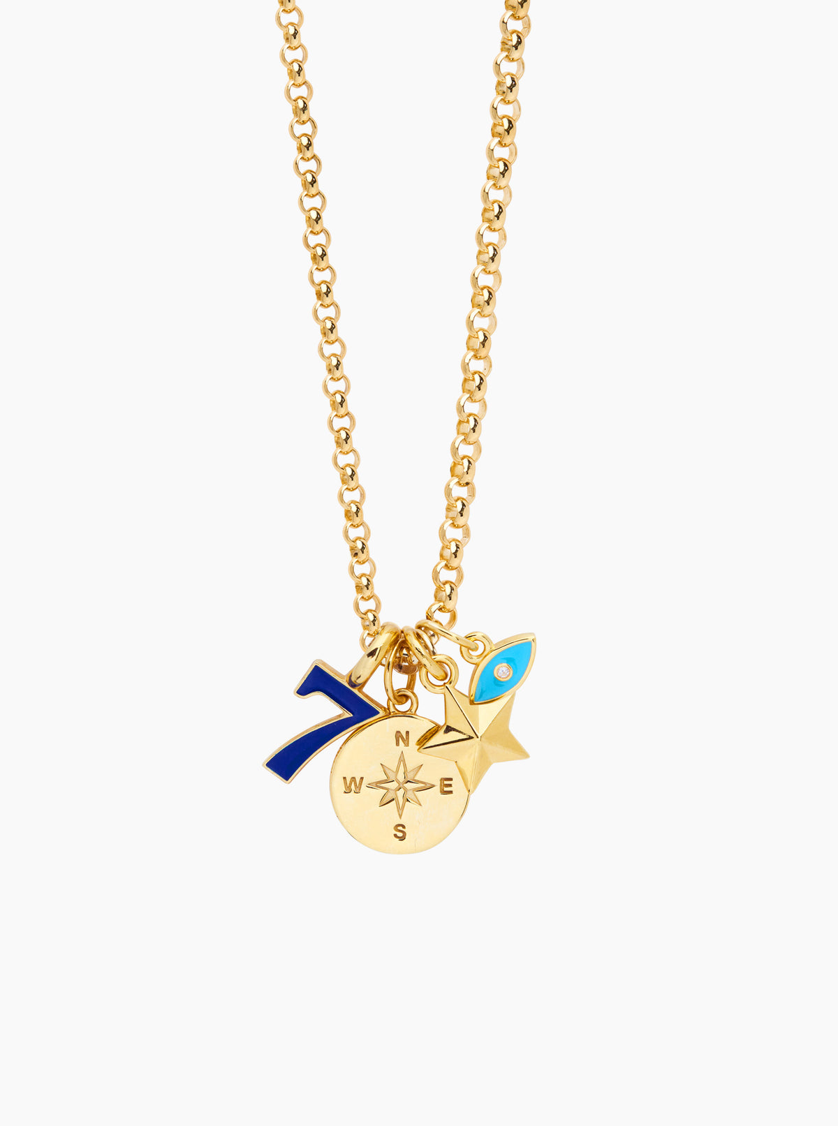 Gold-tone pendant necklace with blue eye charm and starburst charms