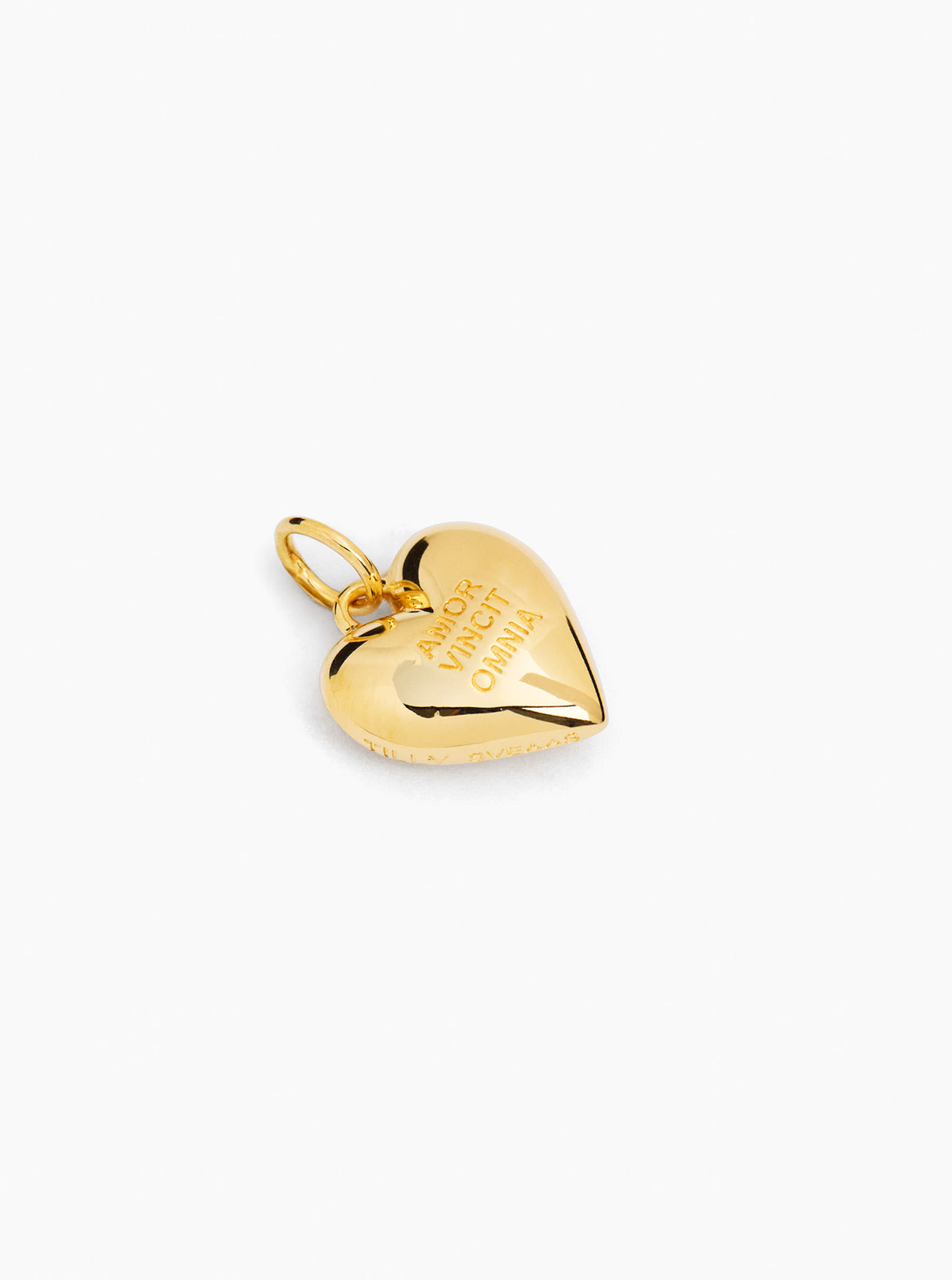Gold heart-shaped charm with top loop ring and engraved lettering