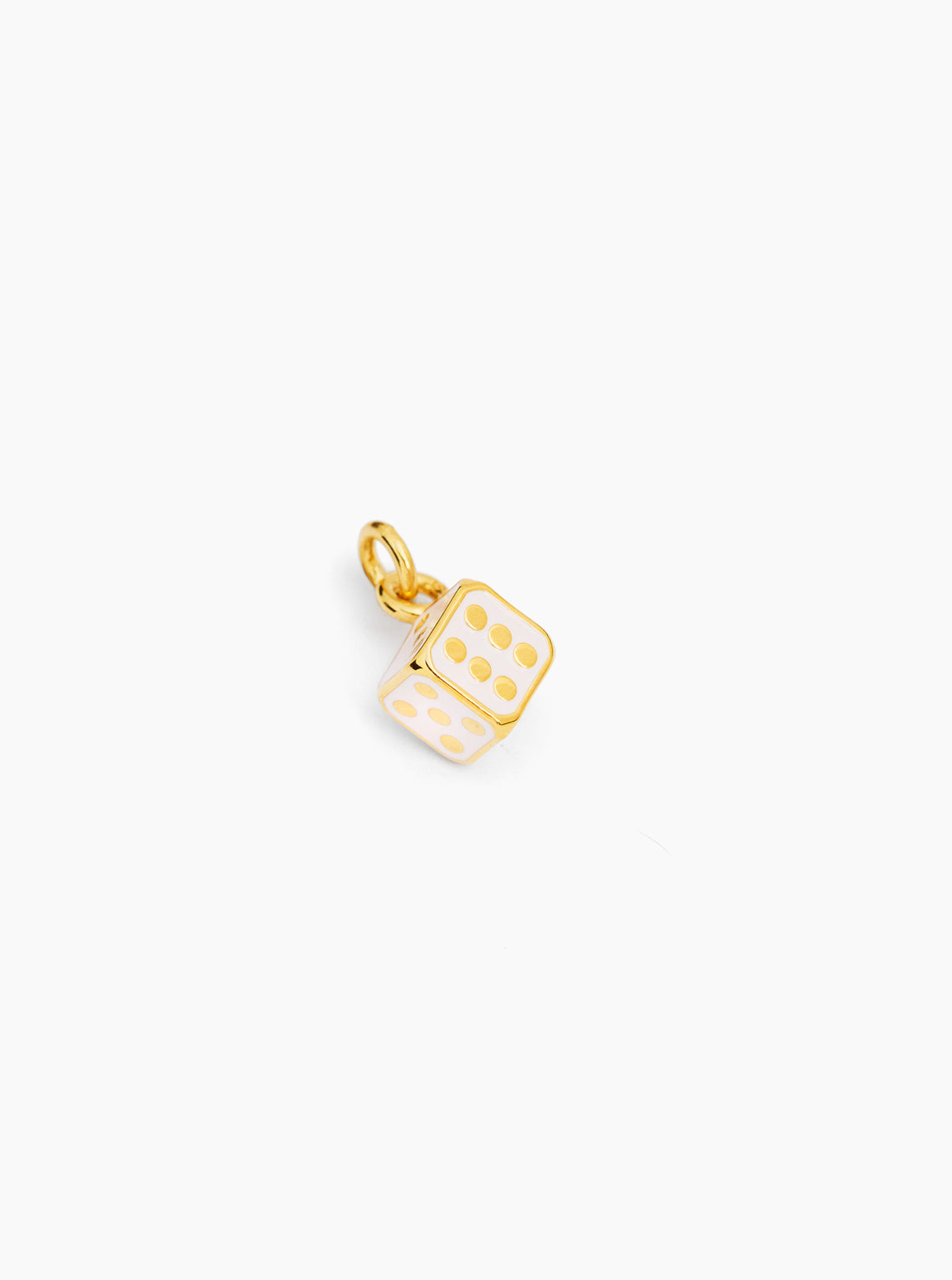 Cream dice charm pendant, side view, with gold ring