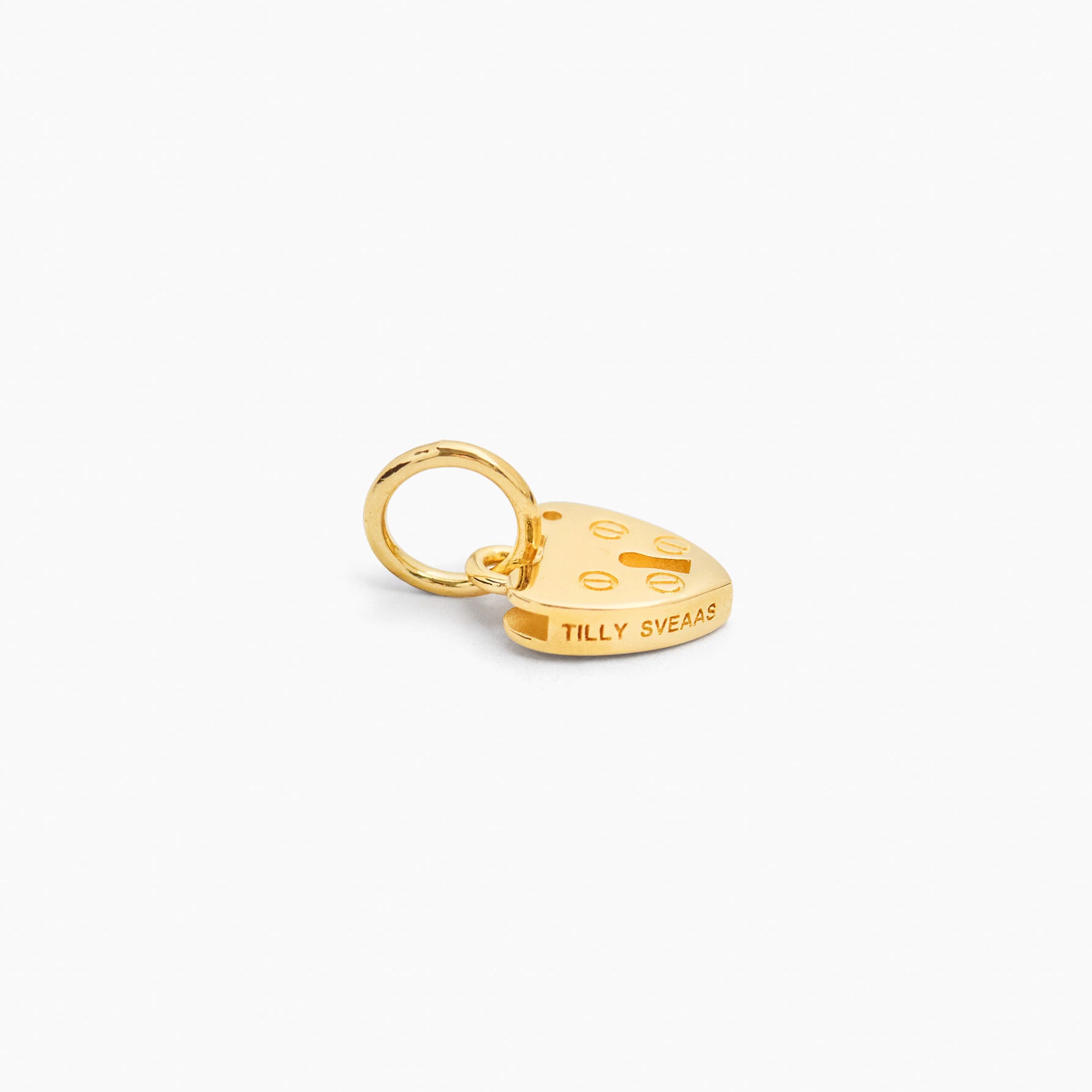 Gold padlock-style charm with open ring and engraved motif