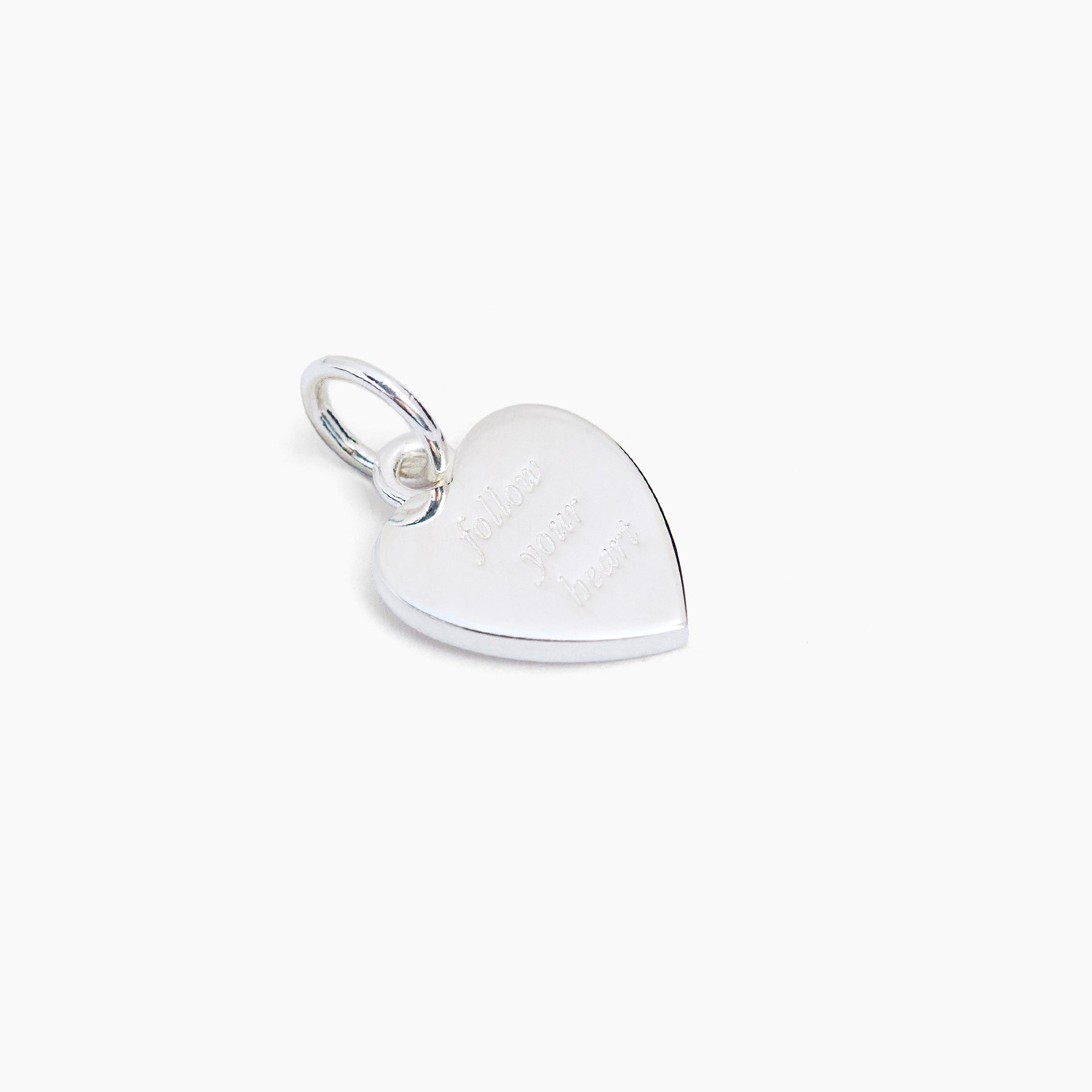 Large silver heart charm with subtle sparkle pattern and ring clasp
