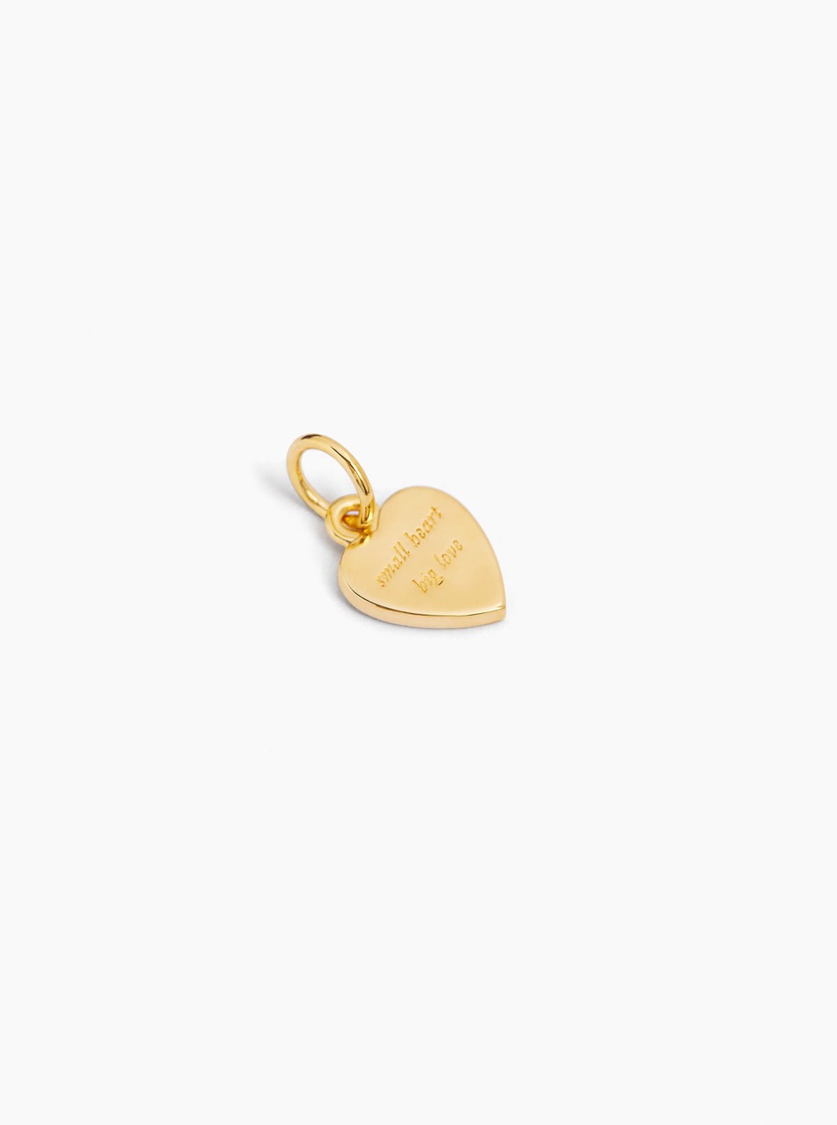 Gold-tone flat heart charm with small starburst detail and hanging loop