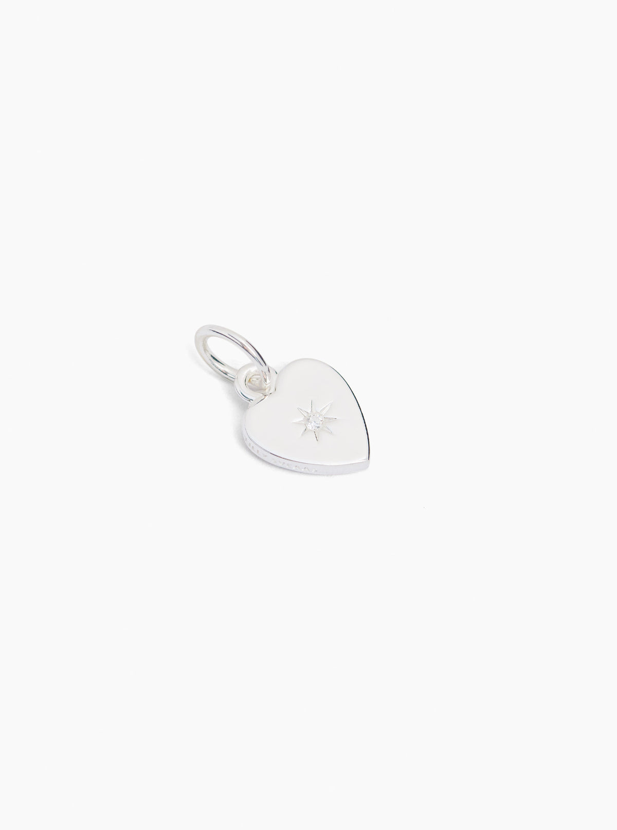 Small silver heart charm with hanging loop, flat heart front with sparkle design