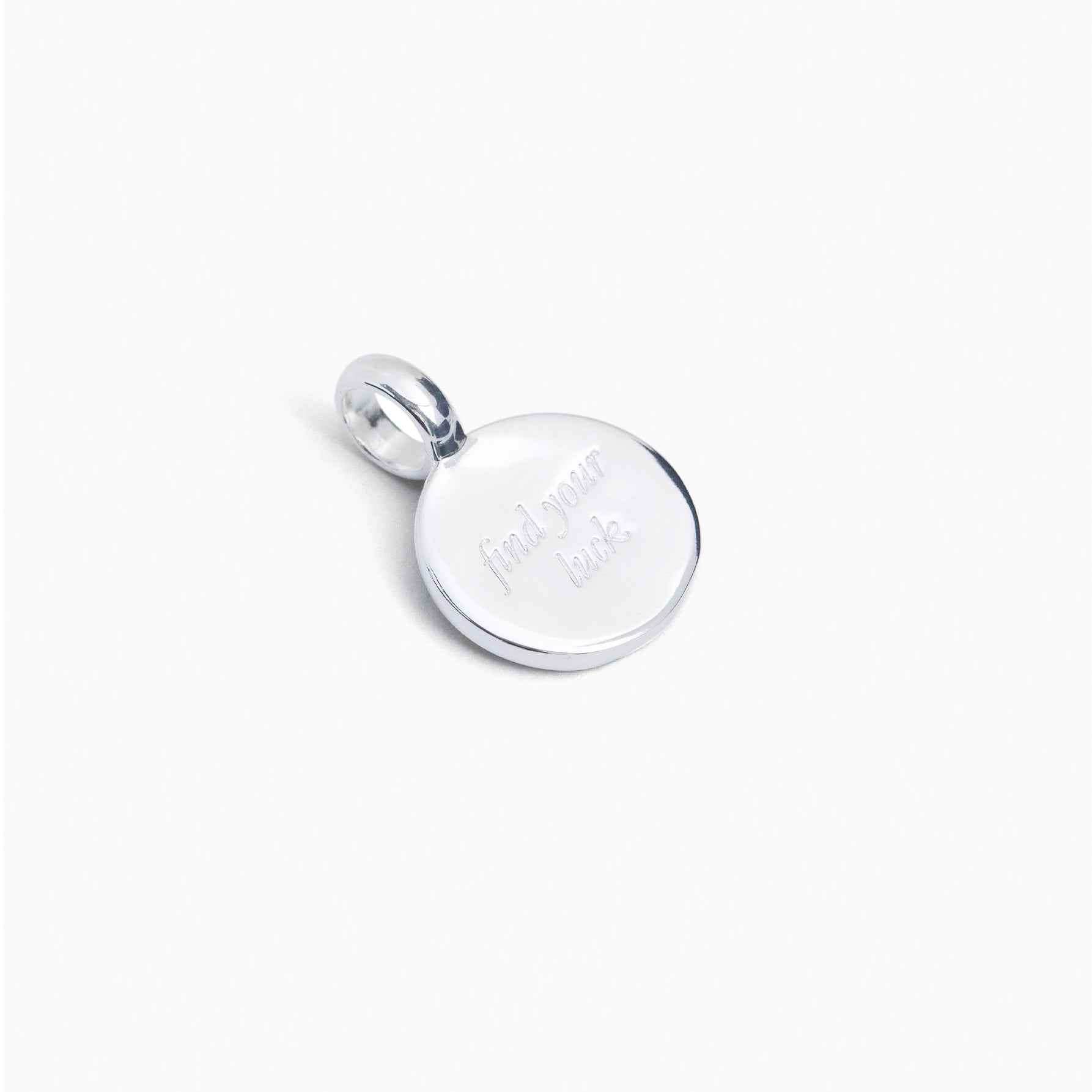 Small silver round clover charm with engraved details and top bail loop