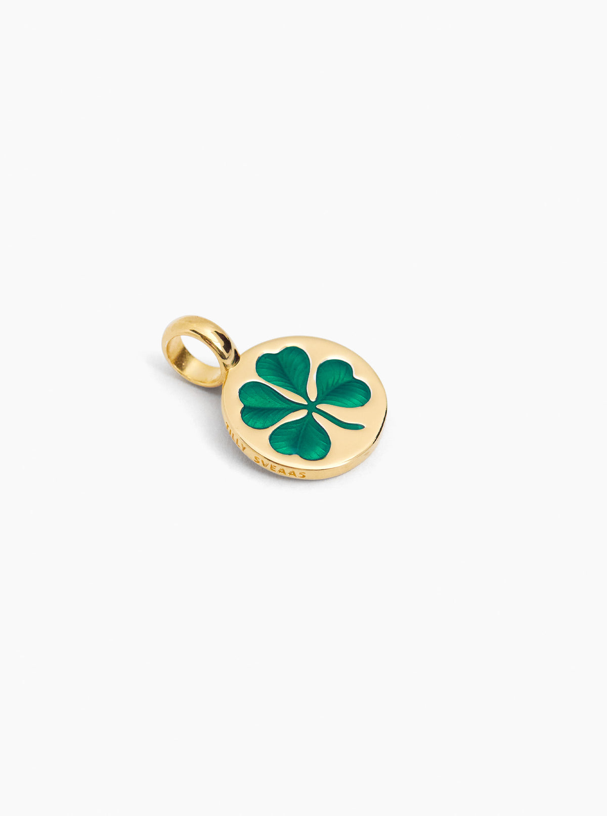Small gold round charm with green four-leaf clover enamel and top loop bail