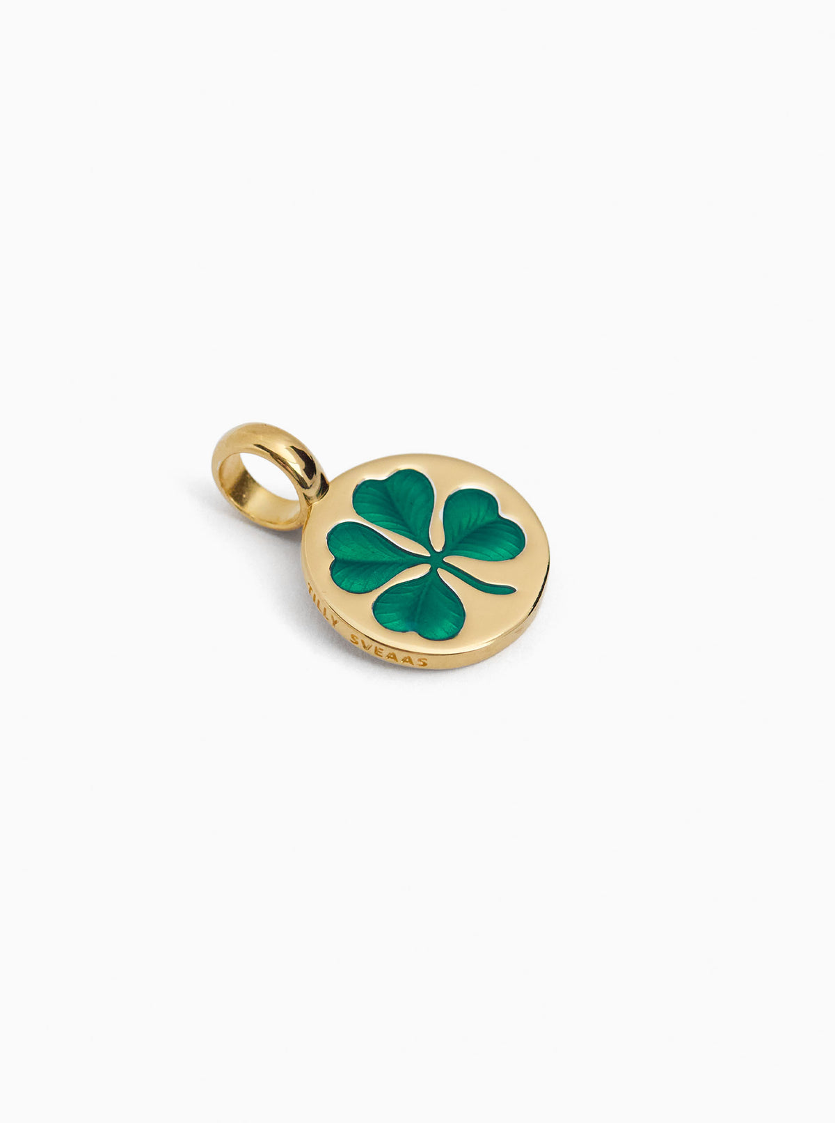 Small gold clover charm with green enamel four-leaf design in round frame