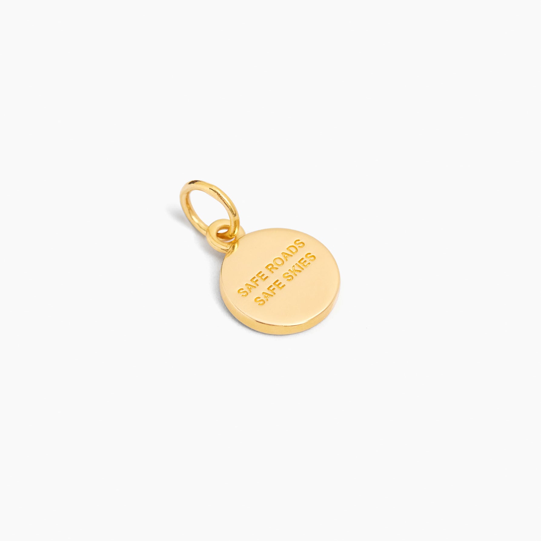 Gold-tone round Saint Christopher charm with engraved text on the back