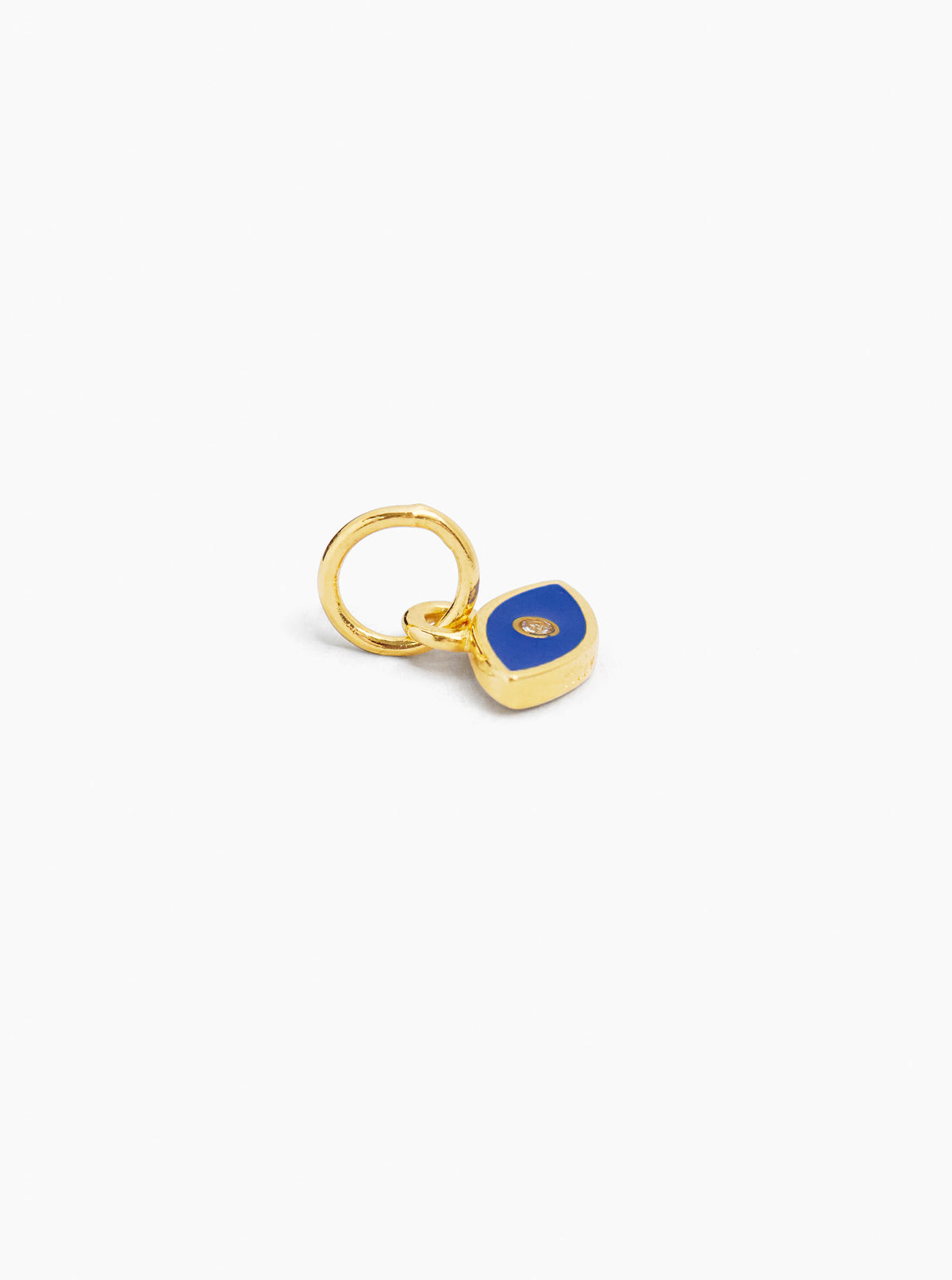 Gold-tone evil eye charm with navy-blue enamel teardrop pendant and loop bail