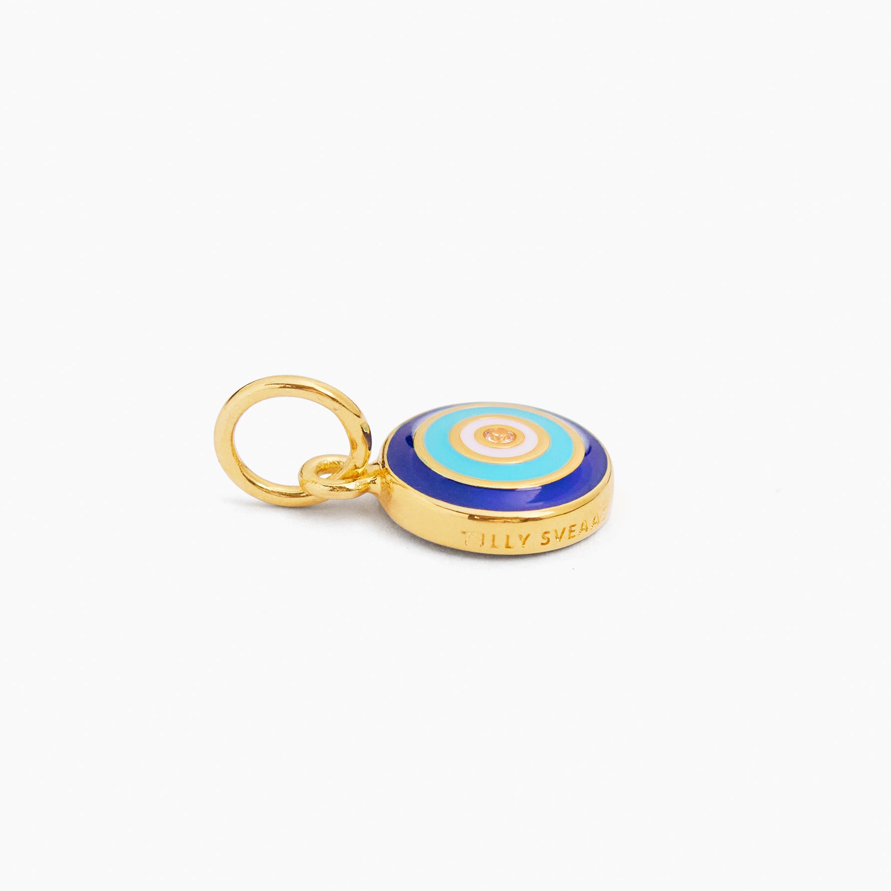 Gold charm with navy and blue evil eye disc and open loop bail