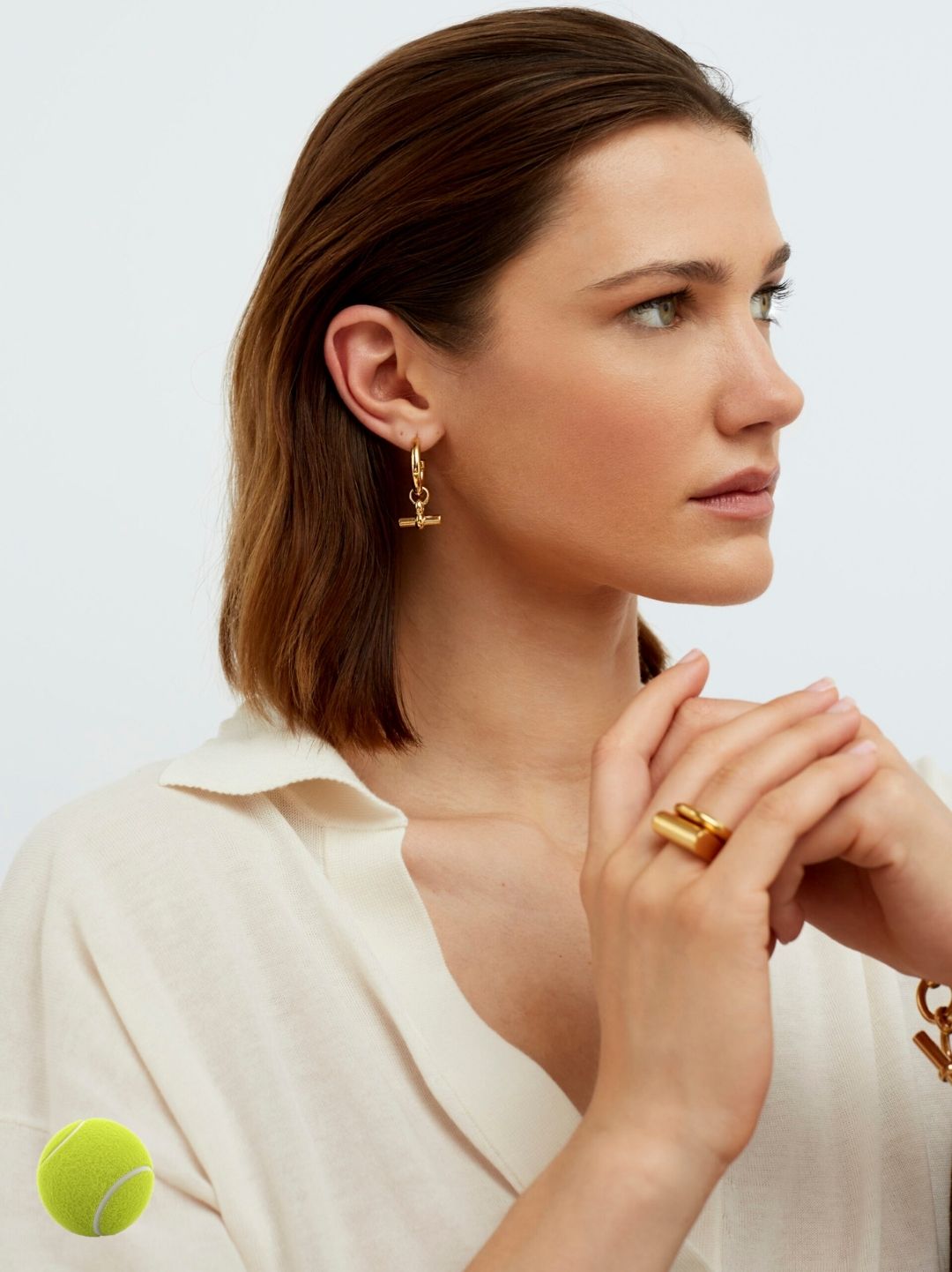 Medium gold T-bar earrings with dangling T-shaped charms