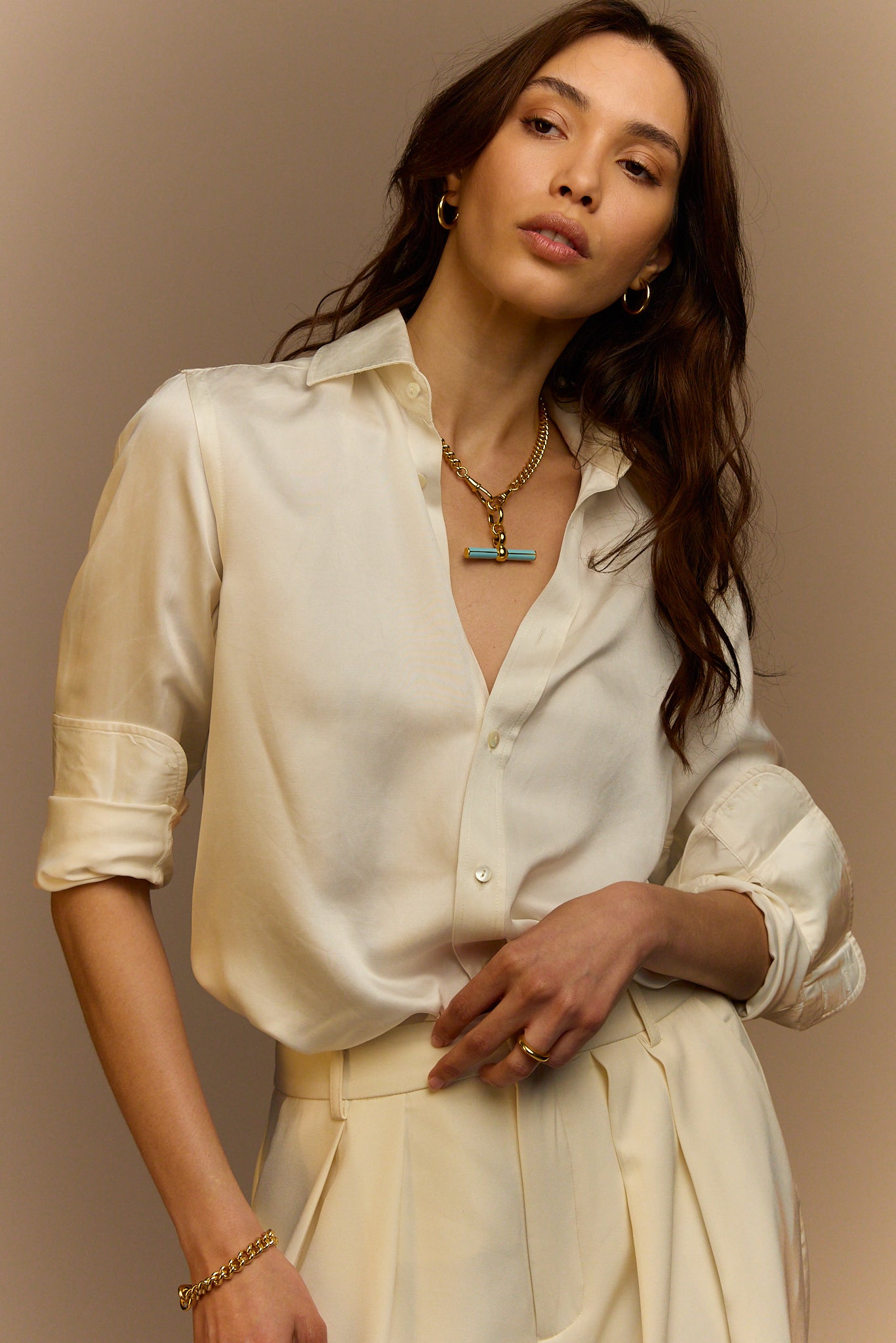 Gold curb-link necklace with blue enamel T-bar pendant