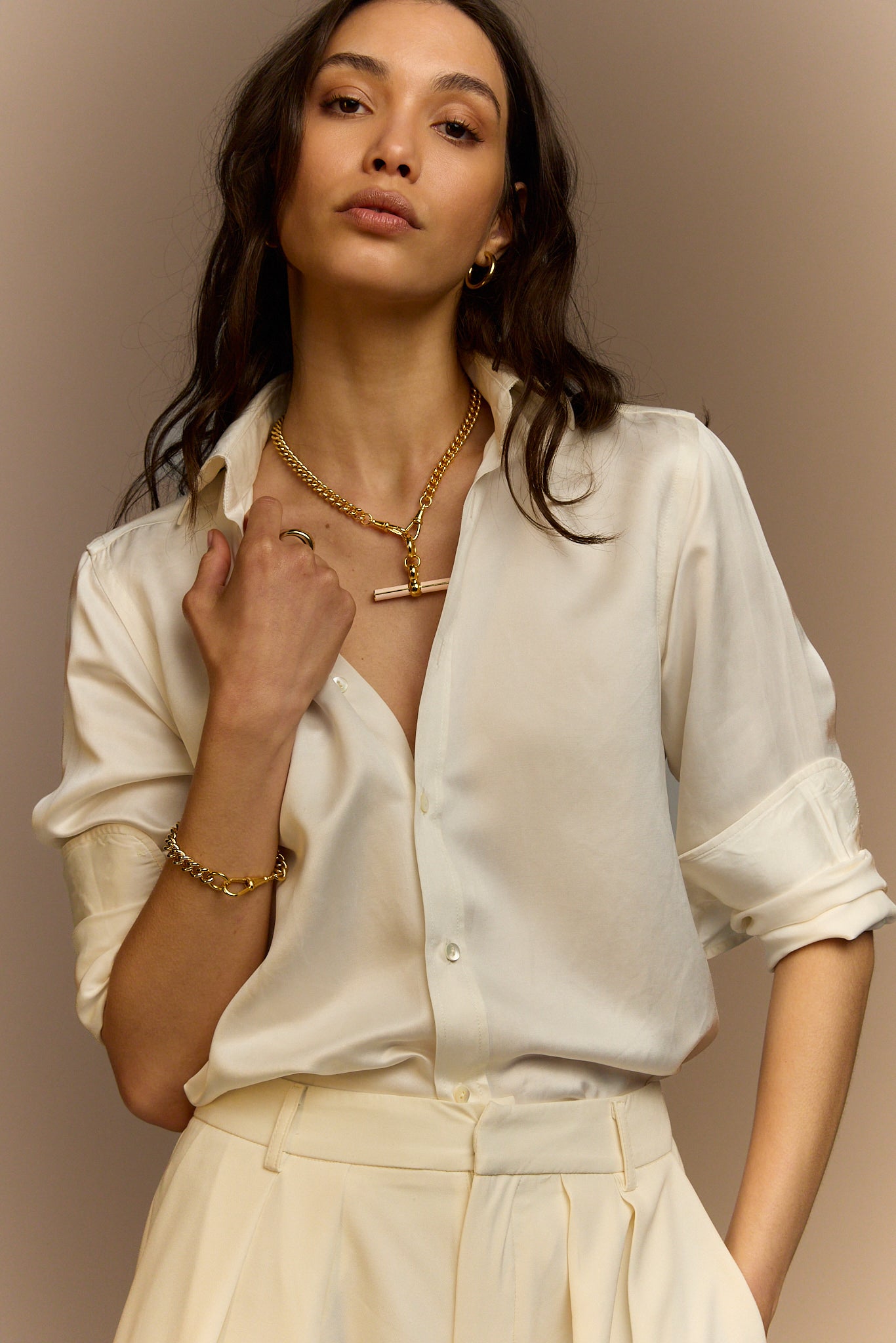 Gold curb-link necklace with cream enamel T-bar pendant