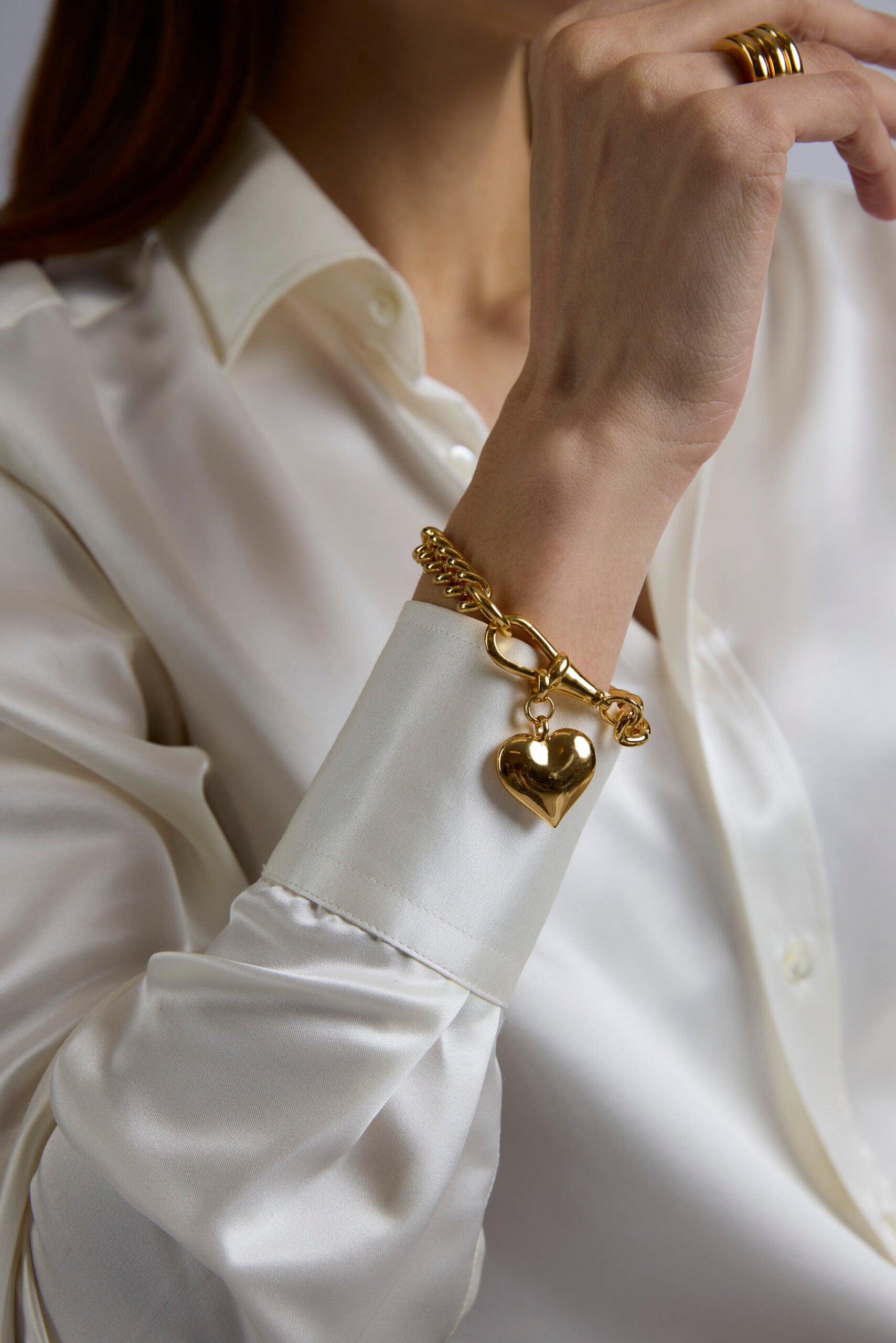 Large Gold Heart on Large Gold Curb Clipt Bracelet