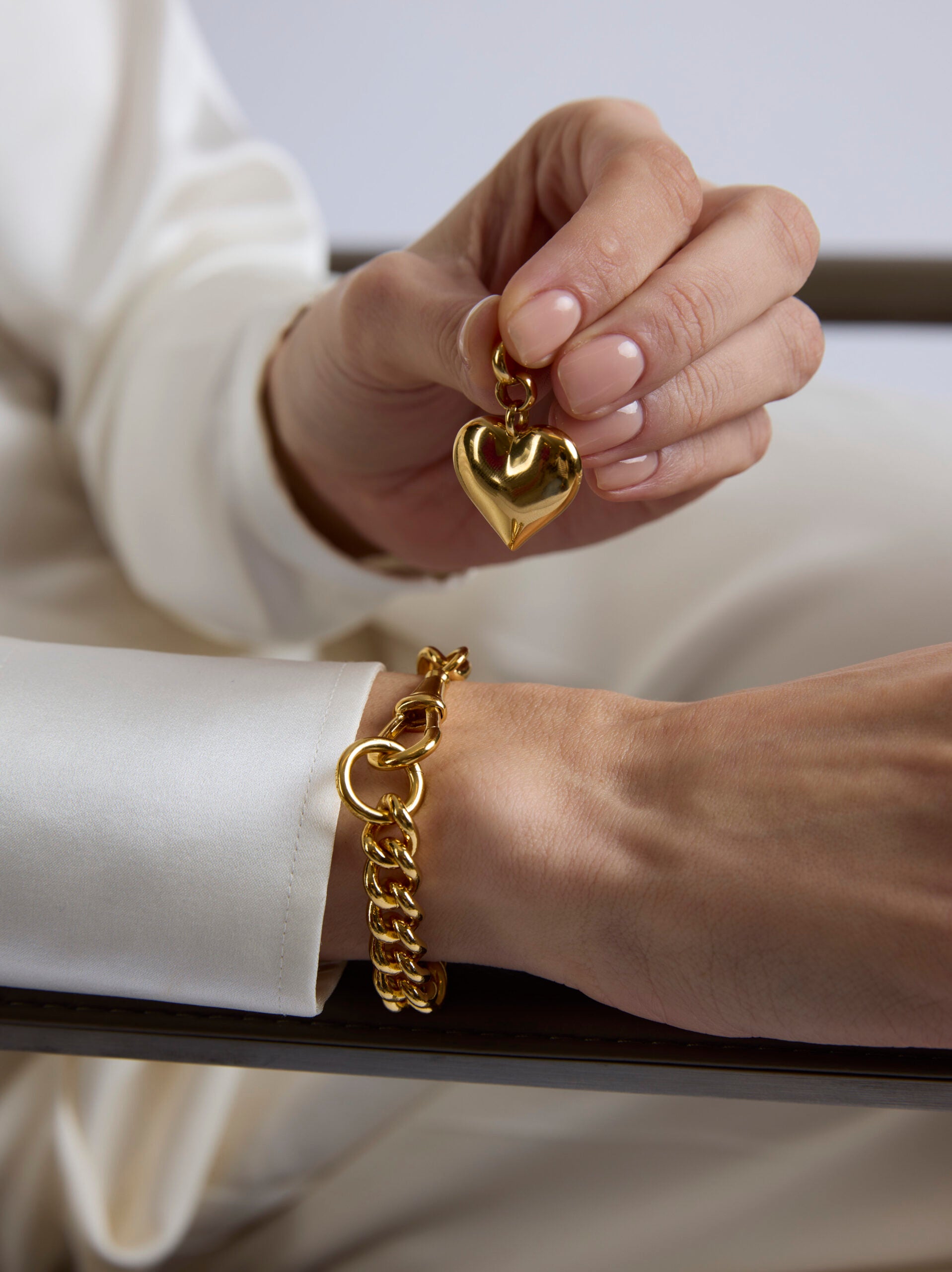 Large Gold Heart on Large Gold Curb Clipt Bracelet