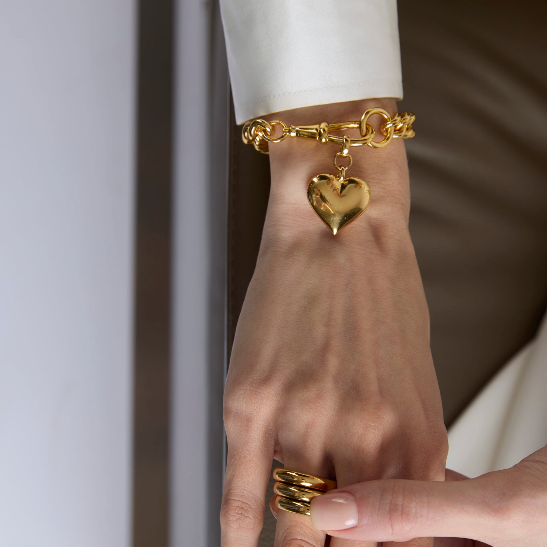 Large Gold Heart on Large Gold Curb Clipt Bracelet