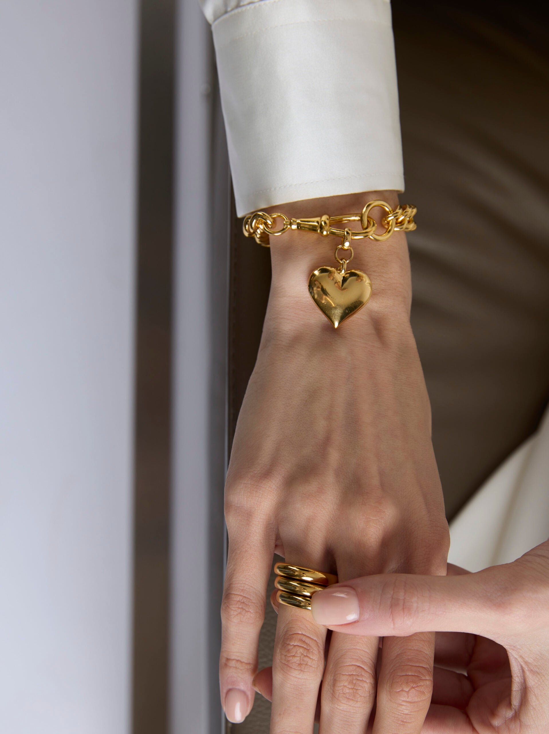 Large Gold Heart on Large Gold Curb Clipt Bracelet