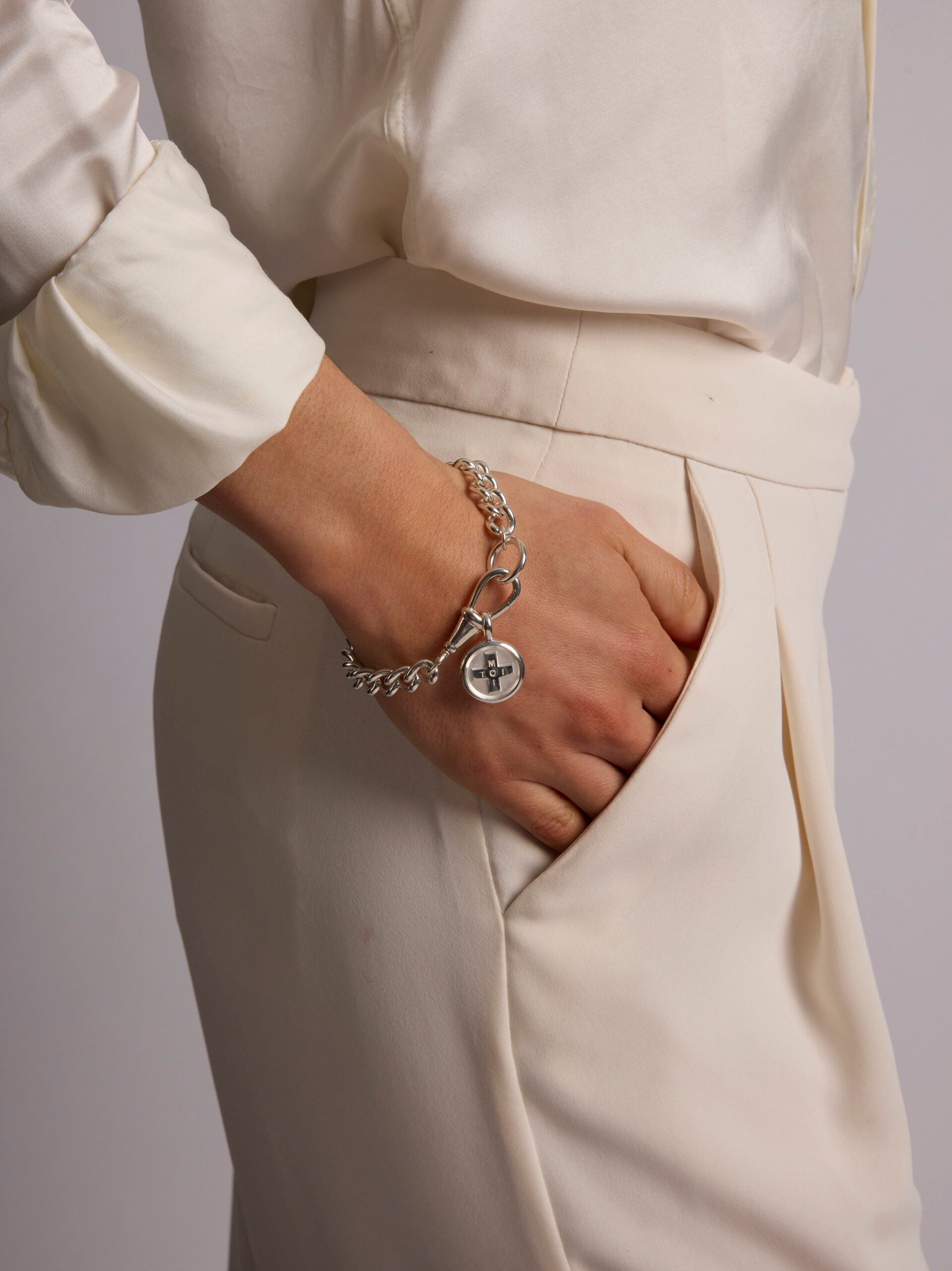 Large Silver Moi + Toi Disc on Large Curb Clip Bracelet