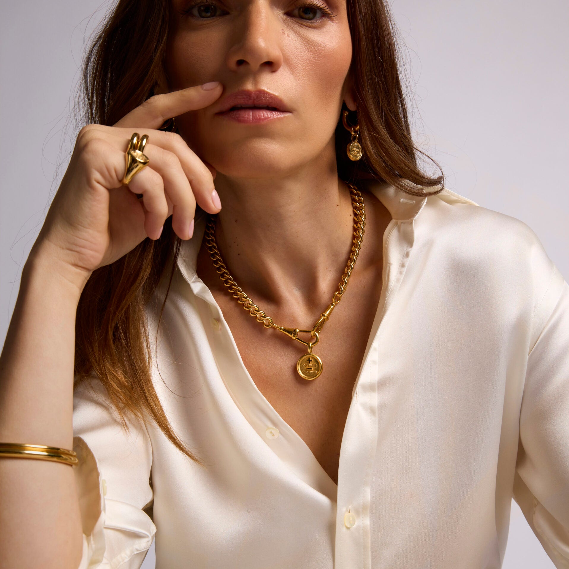 Large Gold Que Demain Disc on Large Curb Clipt Necklace