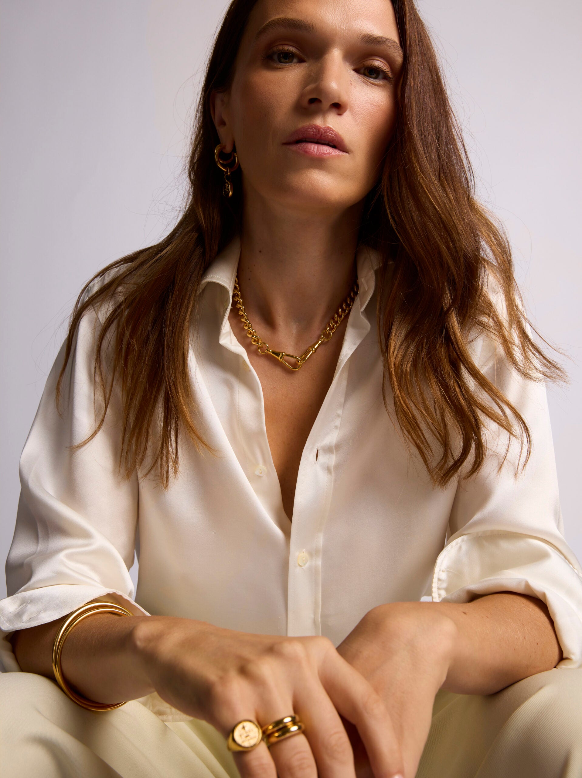 Large Gold Que Demain Disc on Large Curb Clipt Necklace