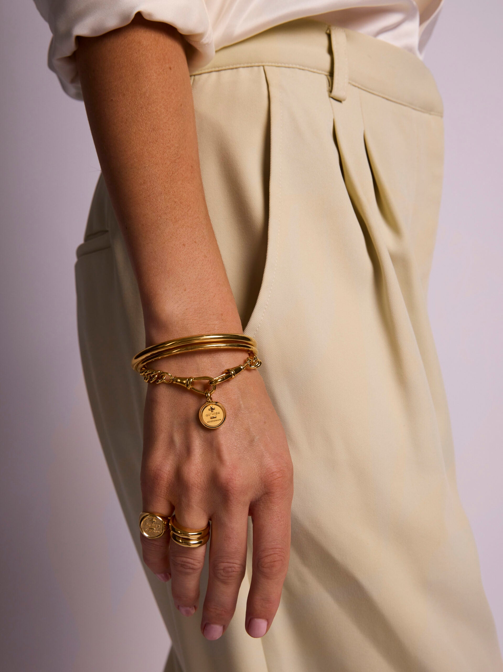 Small Gold Que Demain Disc on Medium Curb Clipt Bracelet