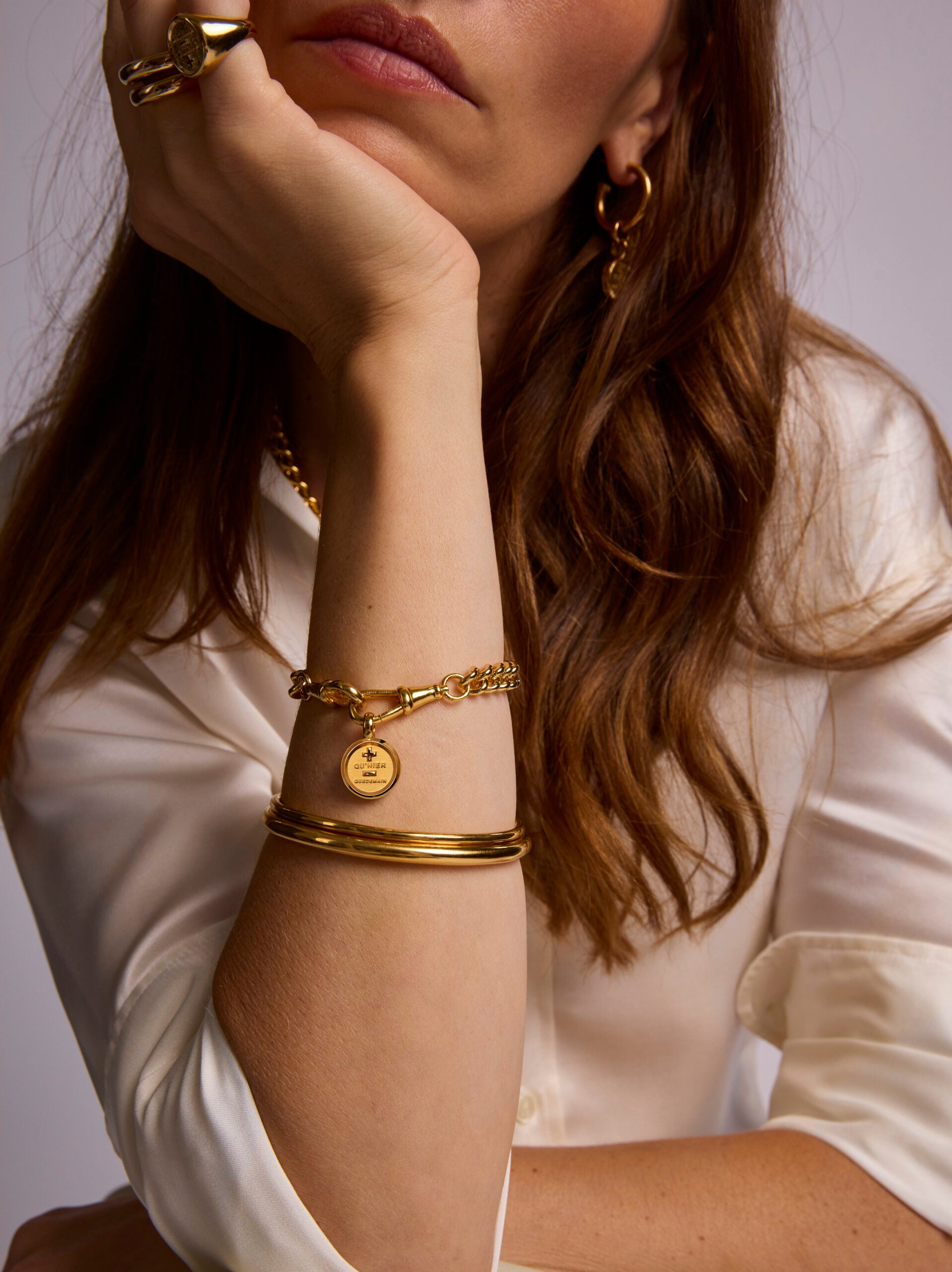 Small Gold Que Demain Disc on Medium Curb Clipt Bracelet