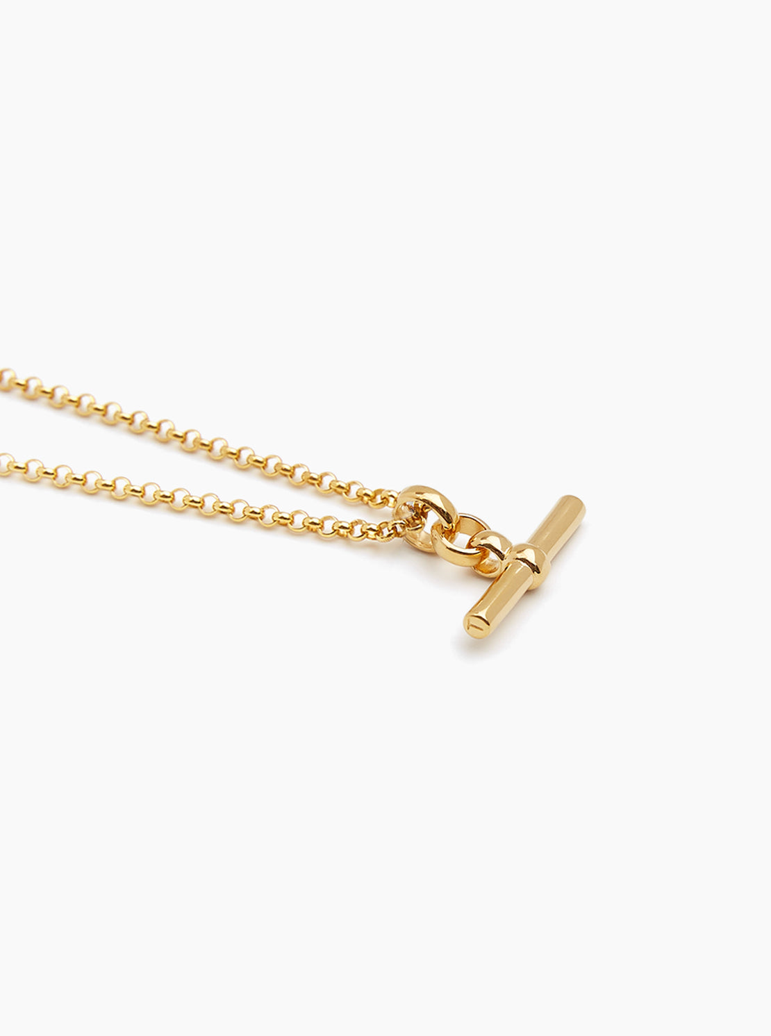 Small gold T-bar necklace on belcher chain 