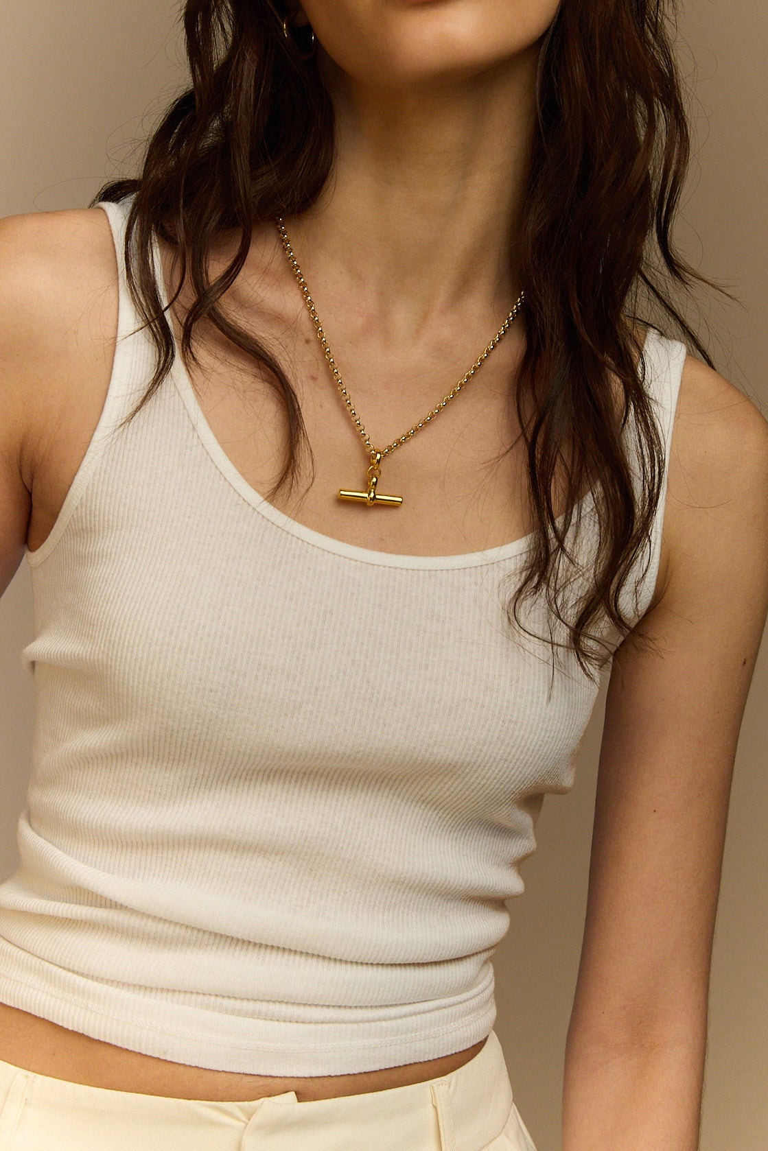 Gold T-bar pendant necklace with short Belcher chain